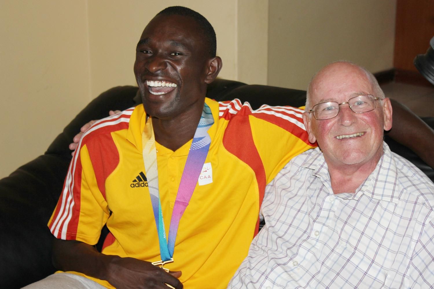World record-holder David Rudisha with his coach, Colm O'Connell