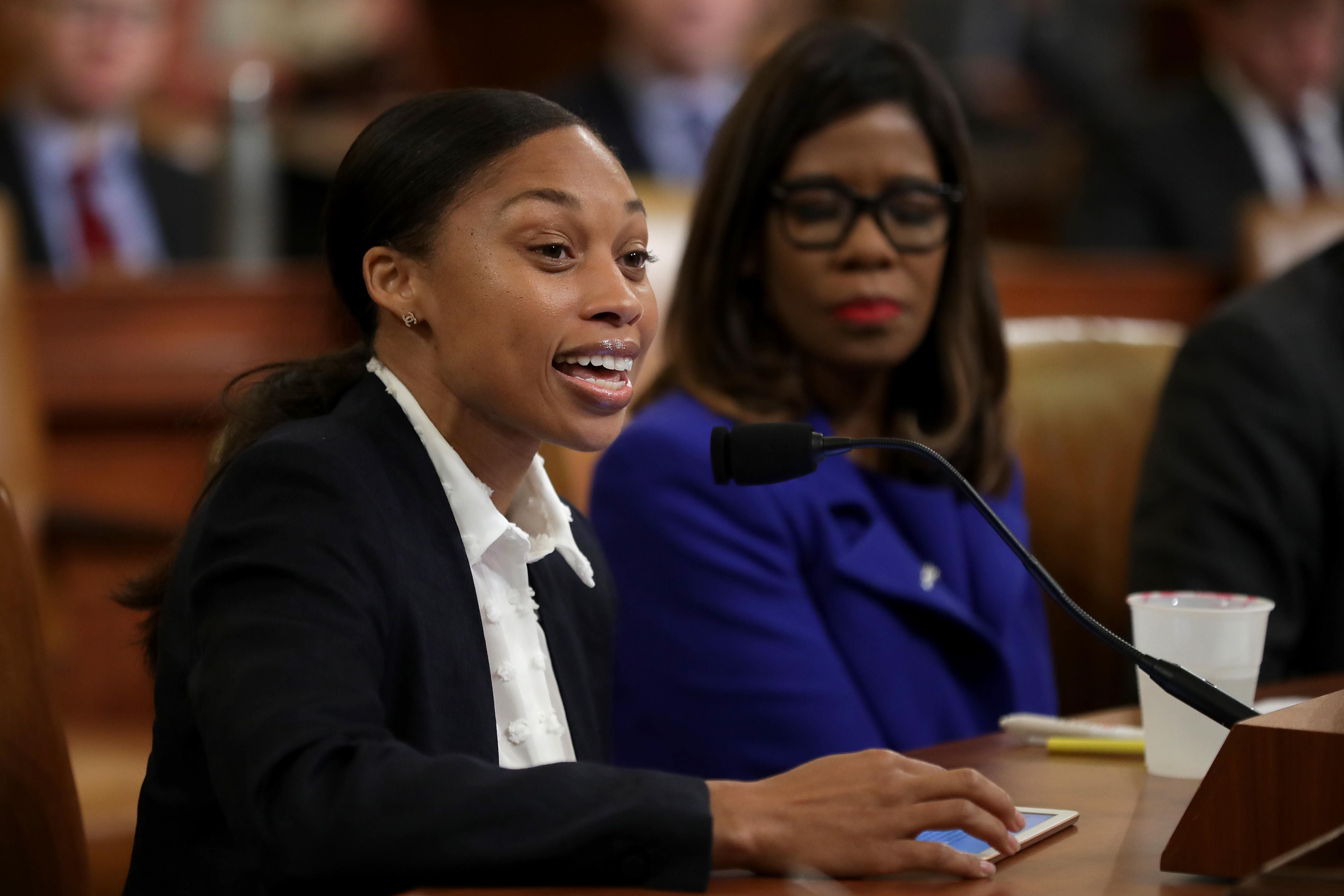 Allyson Felix testifies before the House Ways and Means Committee during a hearing with American Medical Association President-elect Patrice Harris