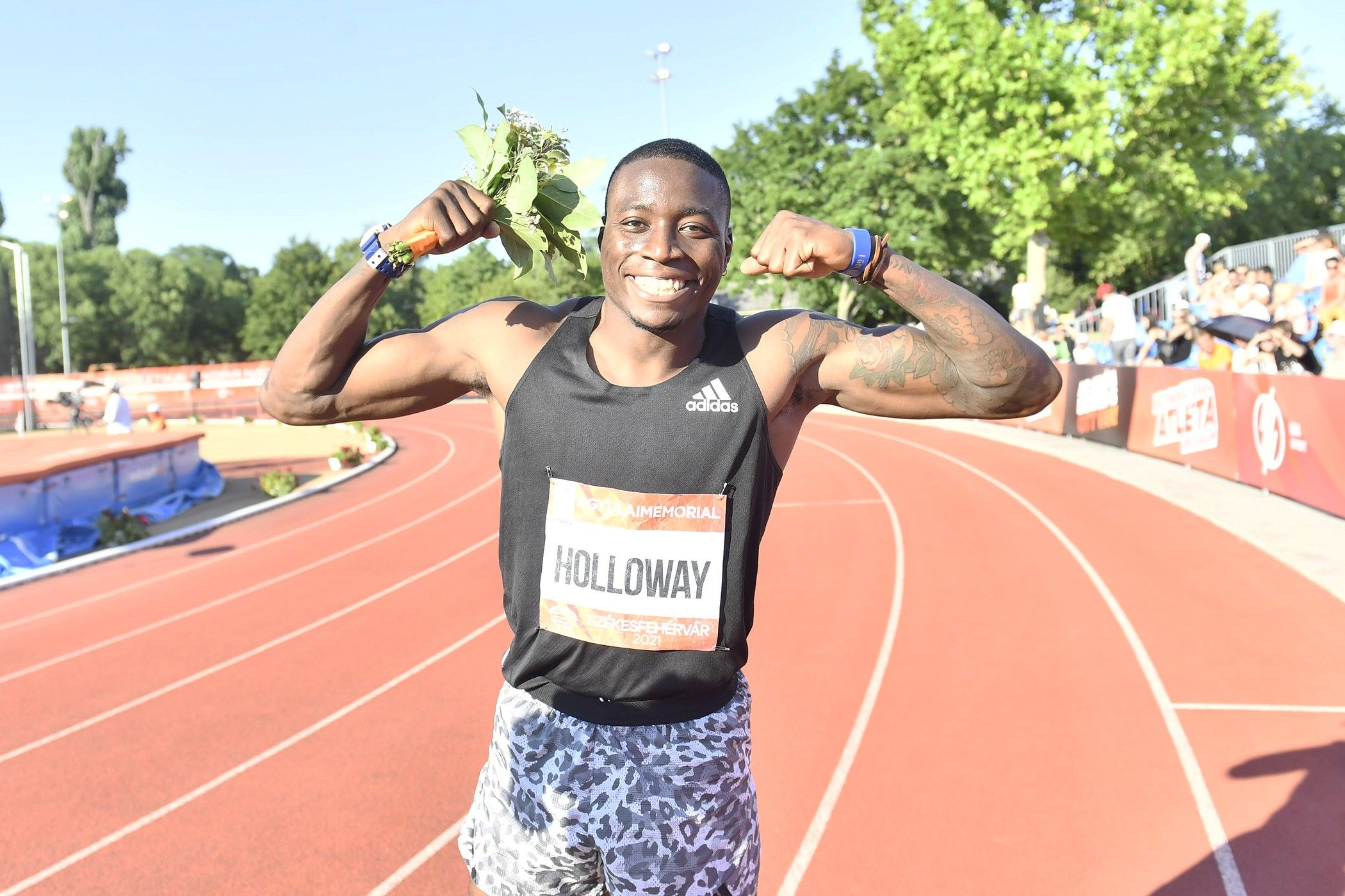 Grant Holloway celebrates his 110m hurdles win at the Gyulai Istvan Memorial