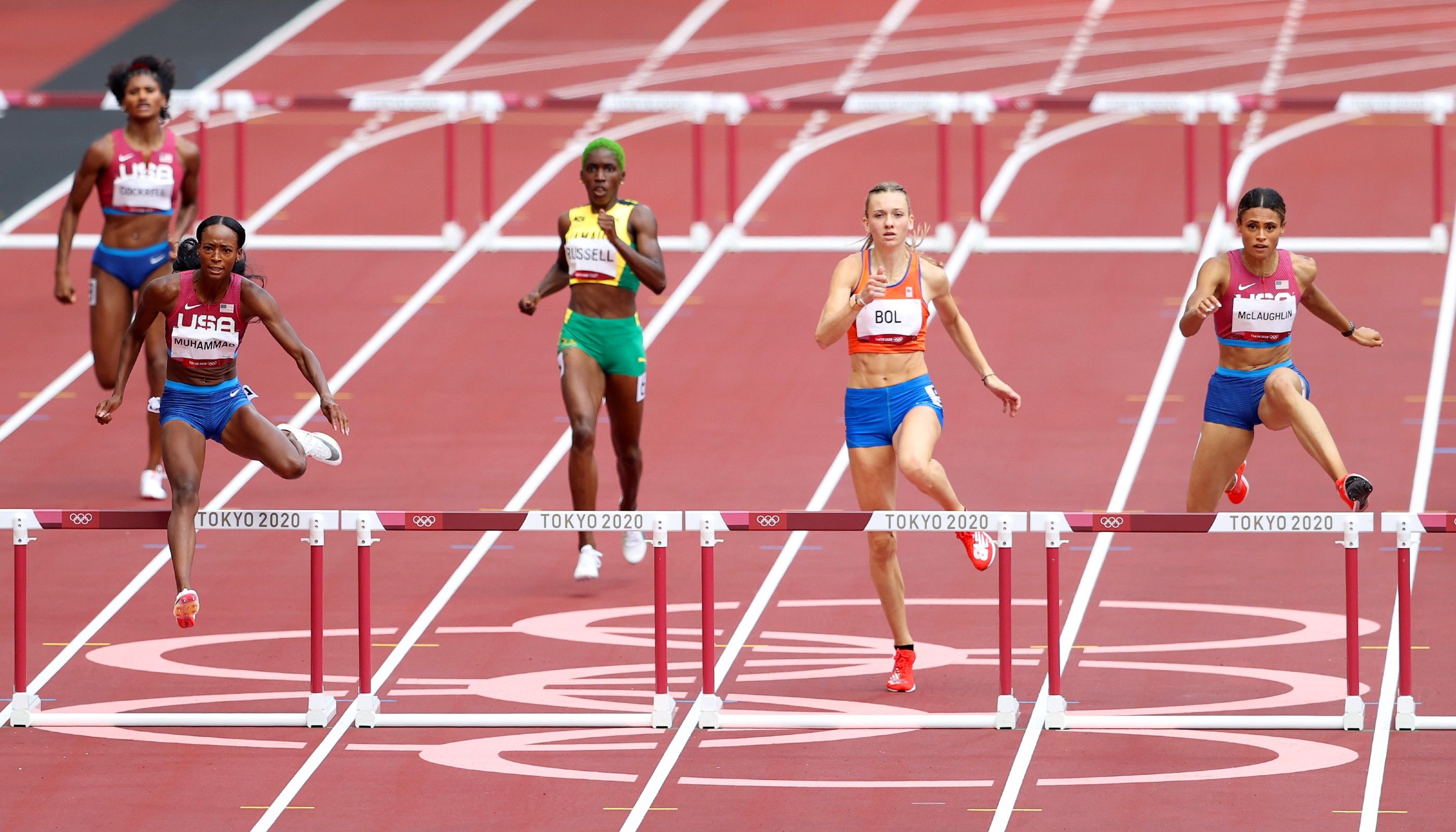 Dalilah Muhammad and Sydney McLaughlin battle for gold in historic Olympic women's 400m hurdles final in Tokyo
