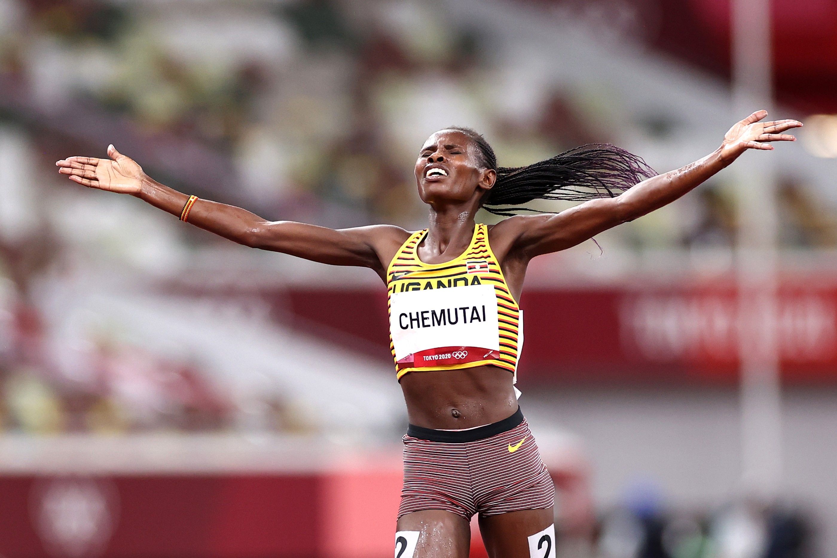 Peruth Chemutai celebrates her 3000m steeplechase win at the Olympic Games in Tokyo