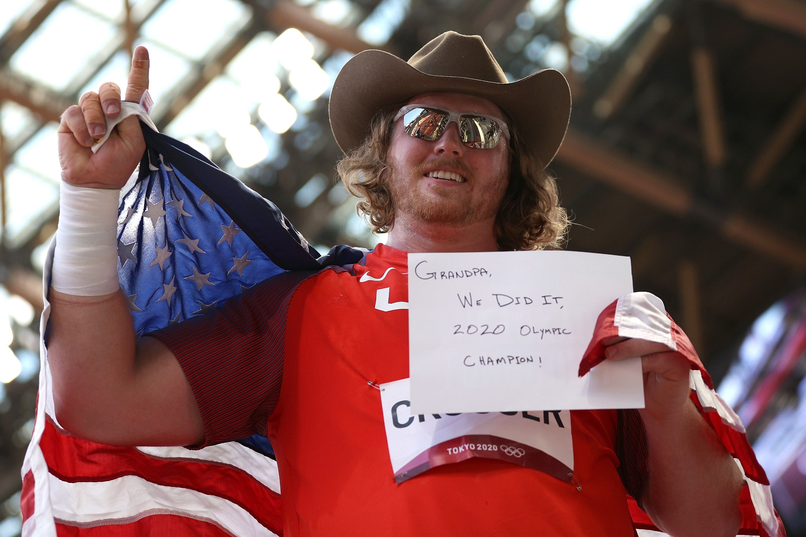 Ryan Crouser celebrates his shot put win at the Tokyo 2020 Olympic Games