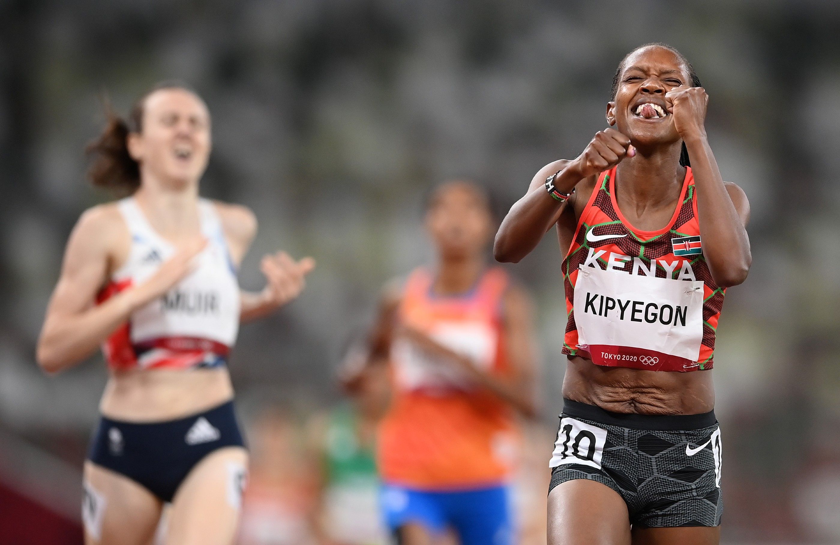 Faith Kipyegon celebrates her 1500m win at the Tokyo 2020 Olympic Games