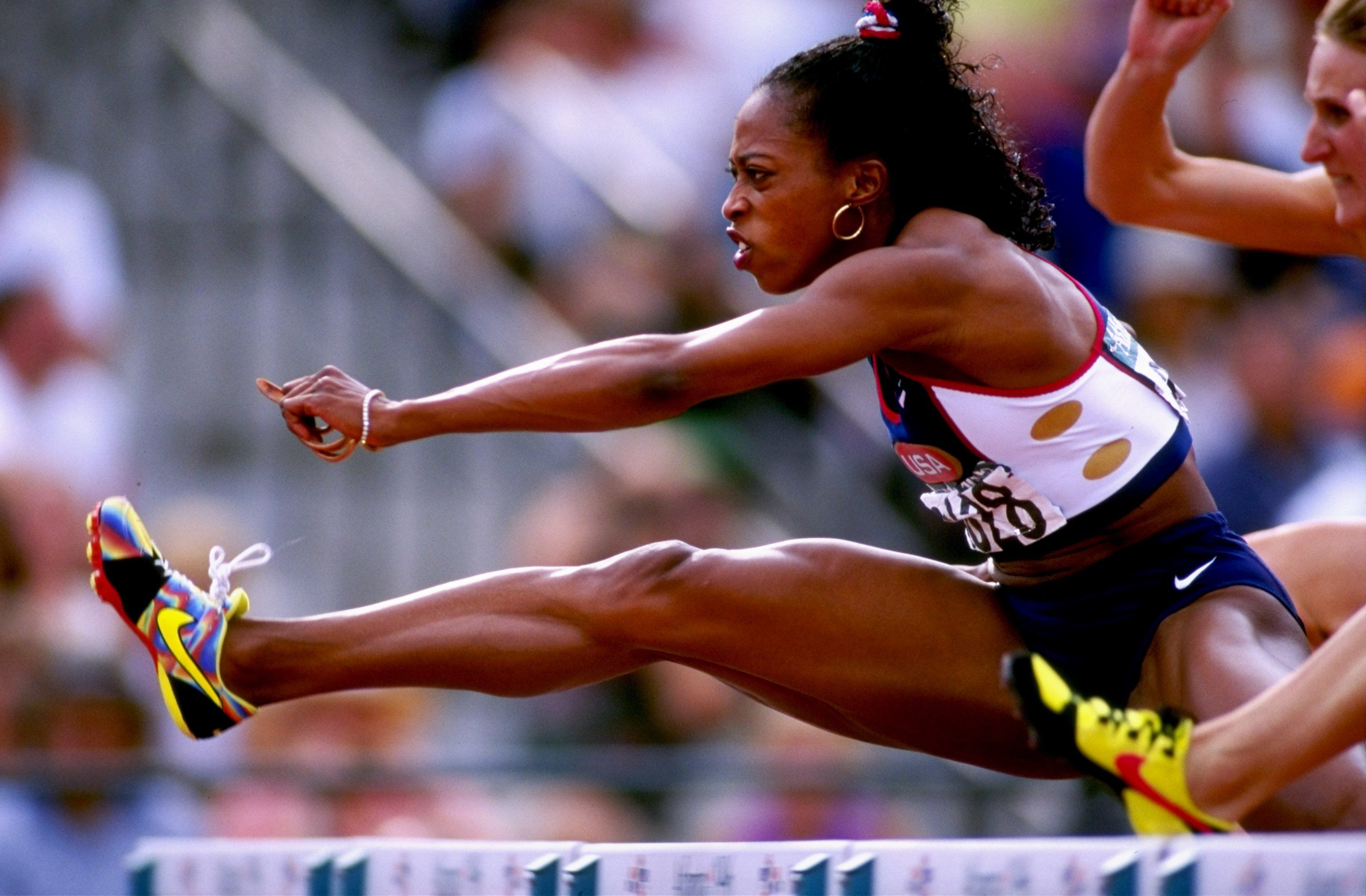 Gail Devers competes in the 100m hurdles at the 1996 Olympic Games in Atlanta