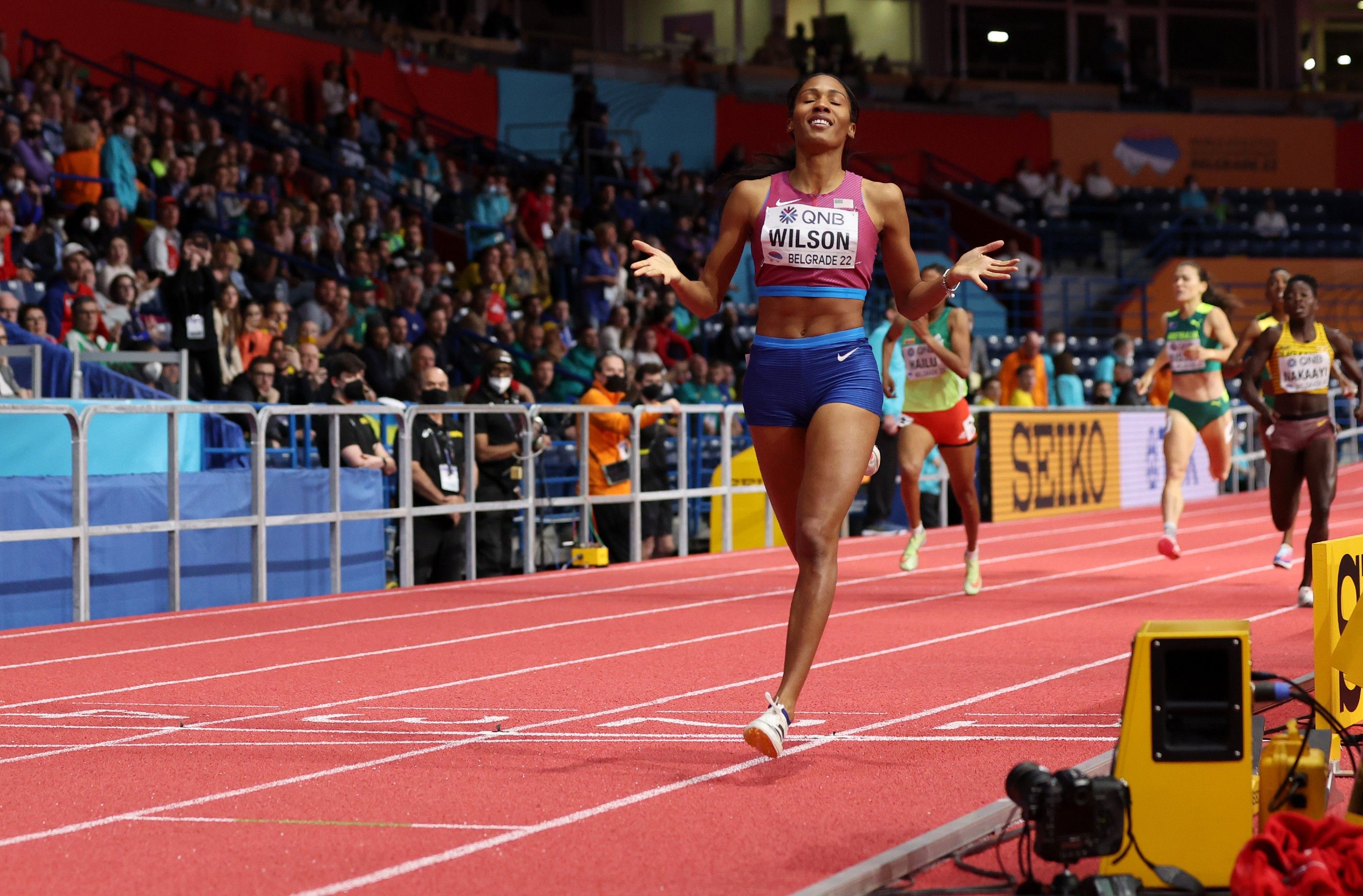 Ajee Wilson celebrates her world indoor 800m win in Belgrade