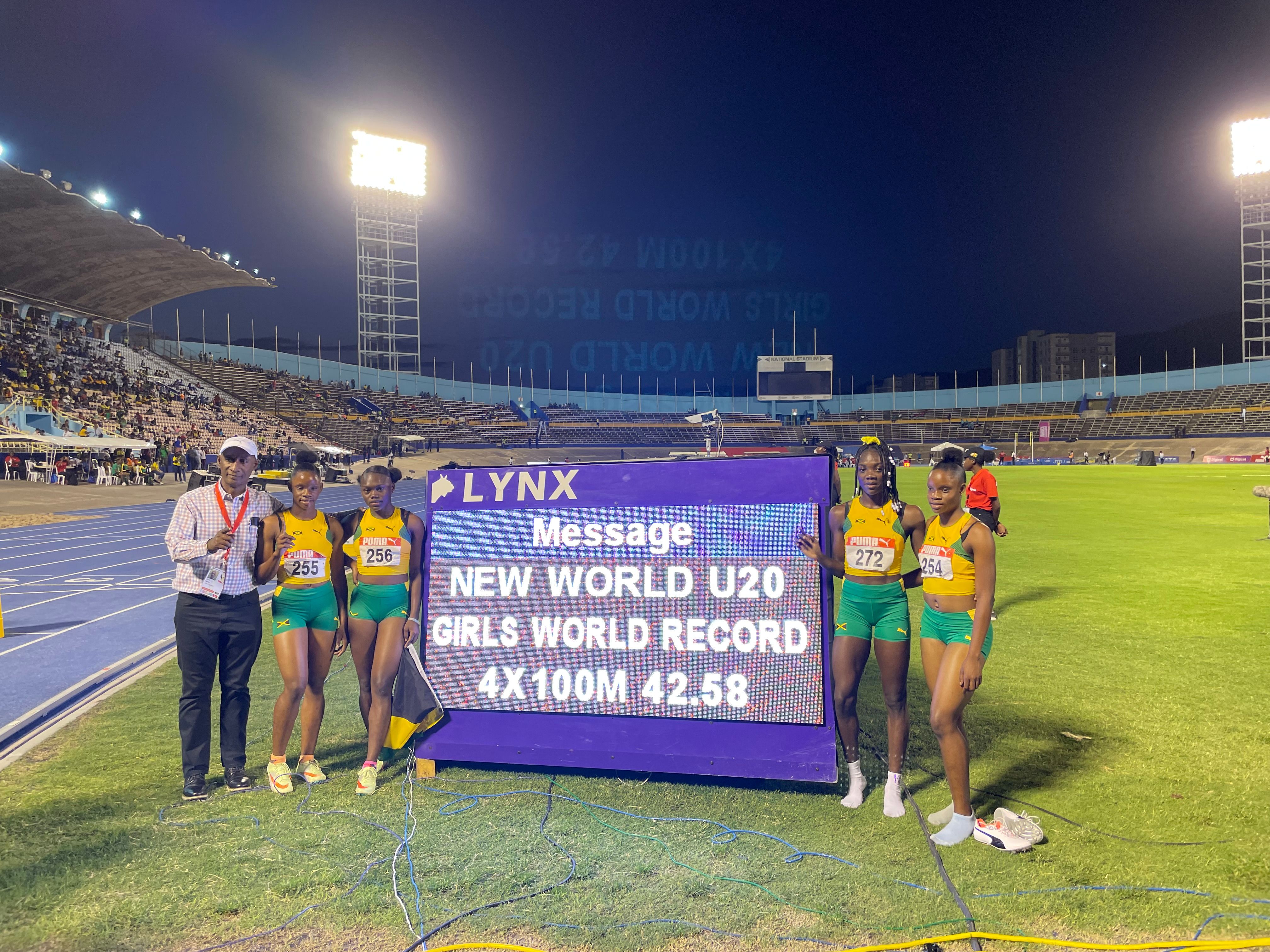 Tina Clayton, Serena Cole, Brianna Lyston and Tia Clayton celebrate their world U20 4x100m record at the Carifta Games