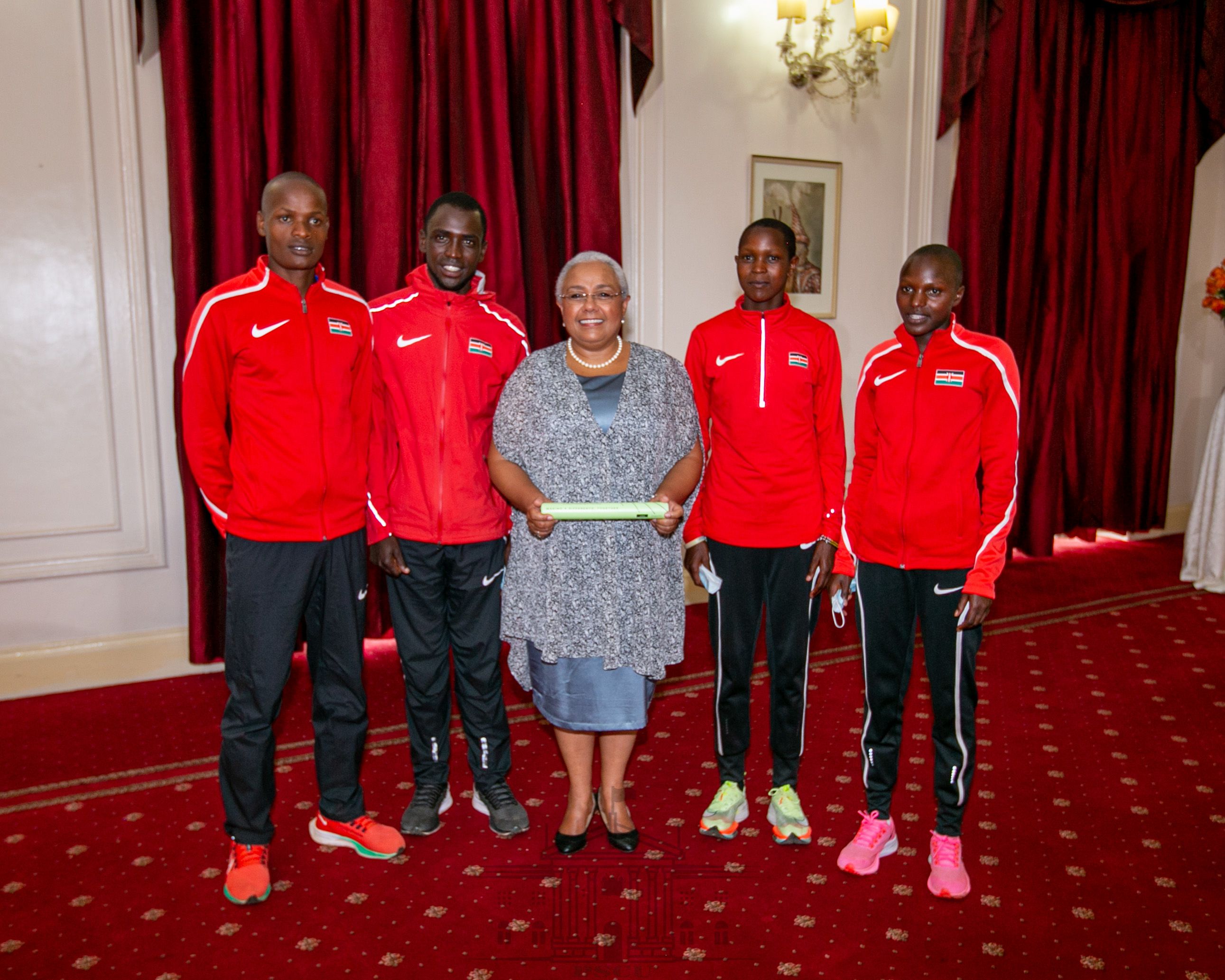 First Lady Margaret Kenyatta with world U20 champions Vincent Keter, Amos Serem, Jackline Chepkoech and Purity Chepkirui