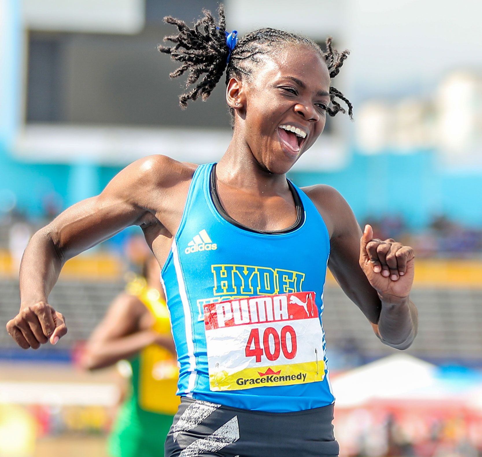 Brianna Lyston celebrates breaking the Champs 200m record