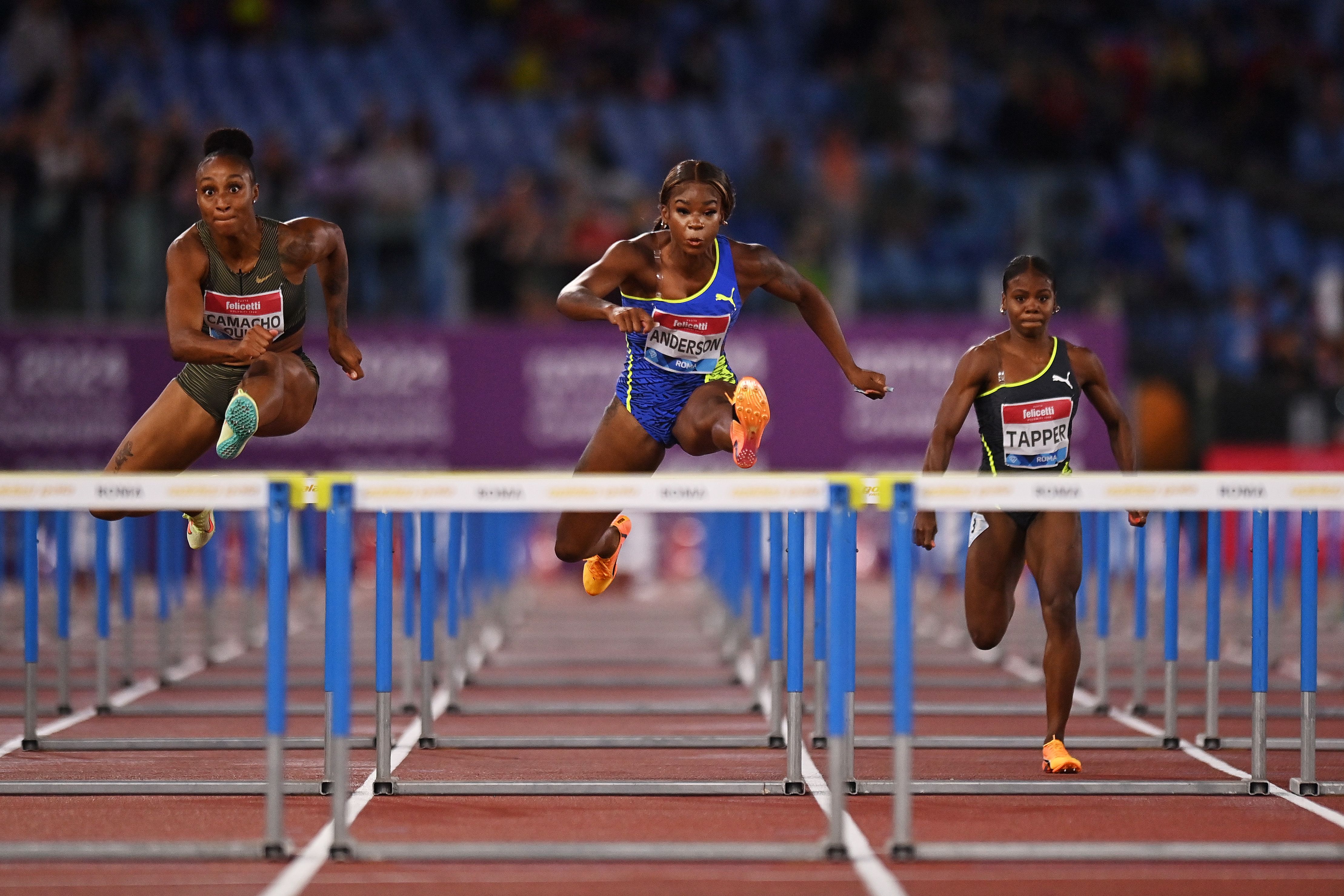 Jasmine Camacho-Quinn and Britany Anderson battle in the women's 100m hurdles at the Wanda Diamond League in Rome