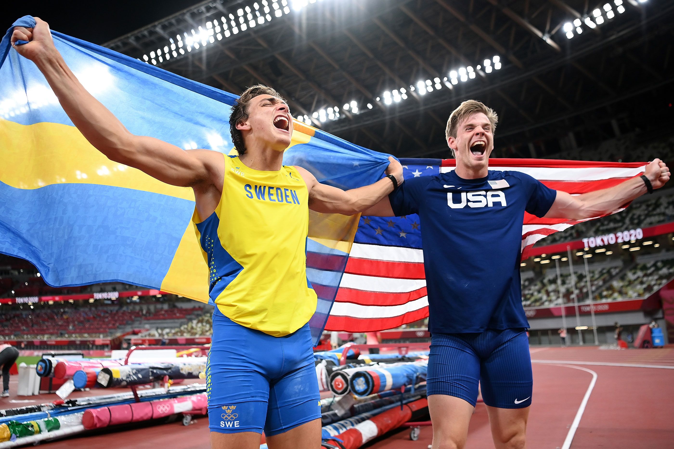 Champion Mondo Duplantis and silver medallist Chris Nilsen celebrate their success at the Olympics in Tokyo