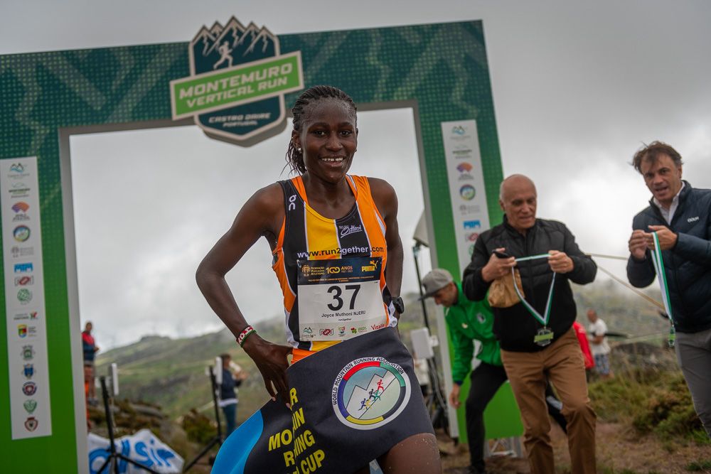 Joyce Muthoni Njeru celebrates her win at the Montemuro Vertical Run