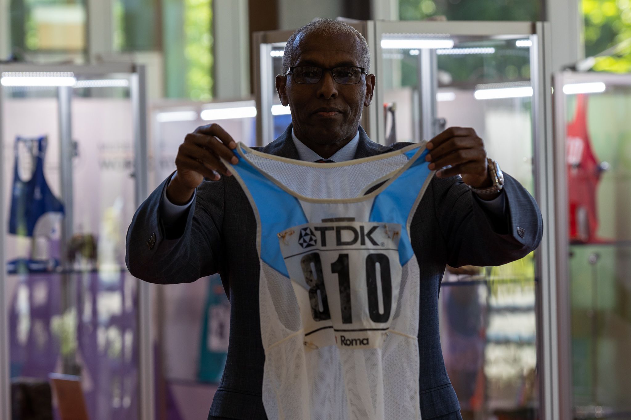 Abdi Bile with his vest at the MOWA Track & Field Heritage Exhibition Oregon22 in Eugene