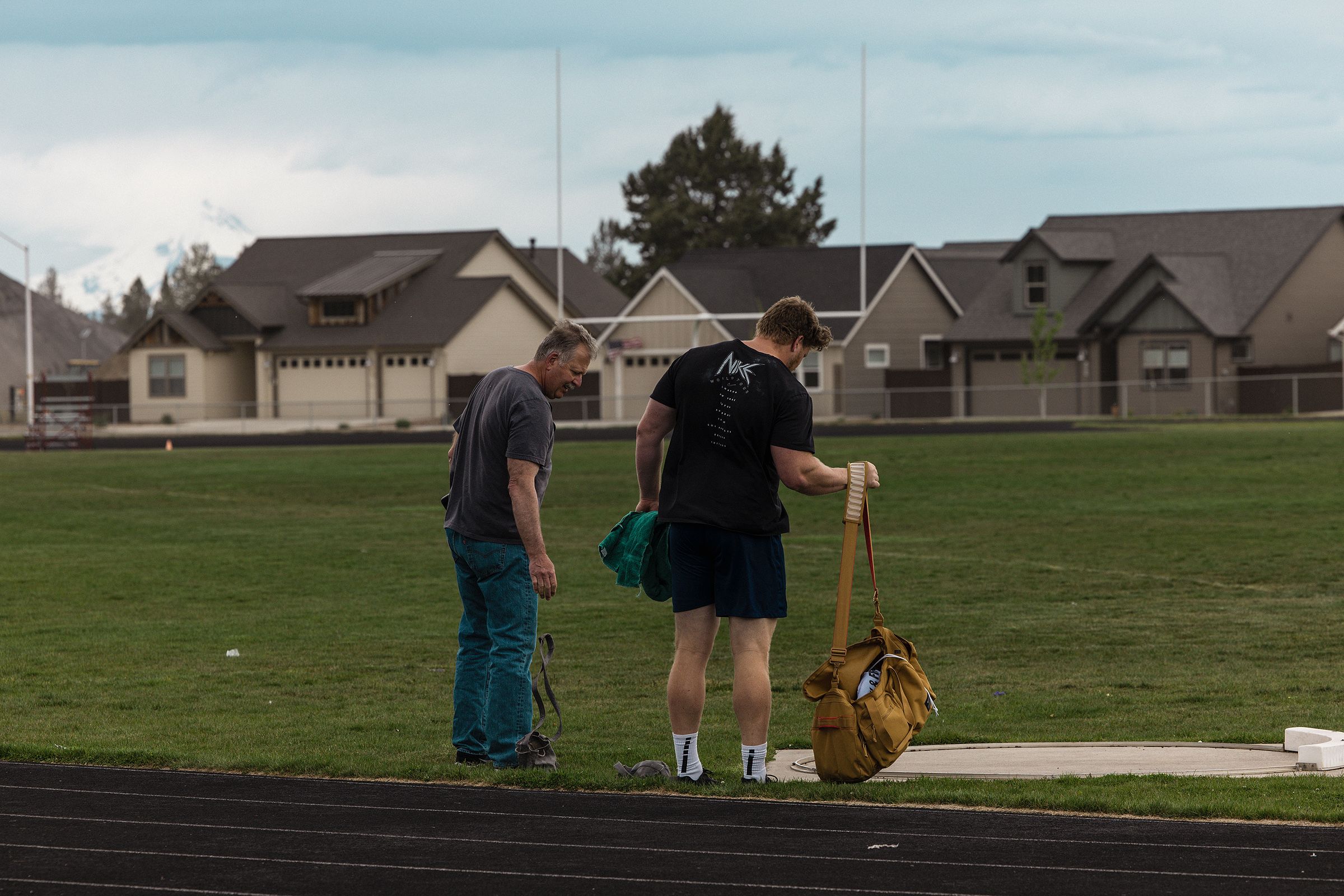 Ryan Crouser with his father Mitch