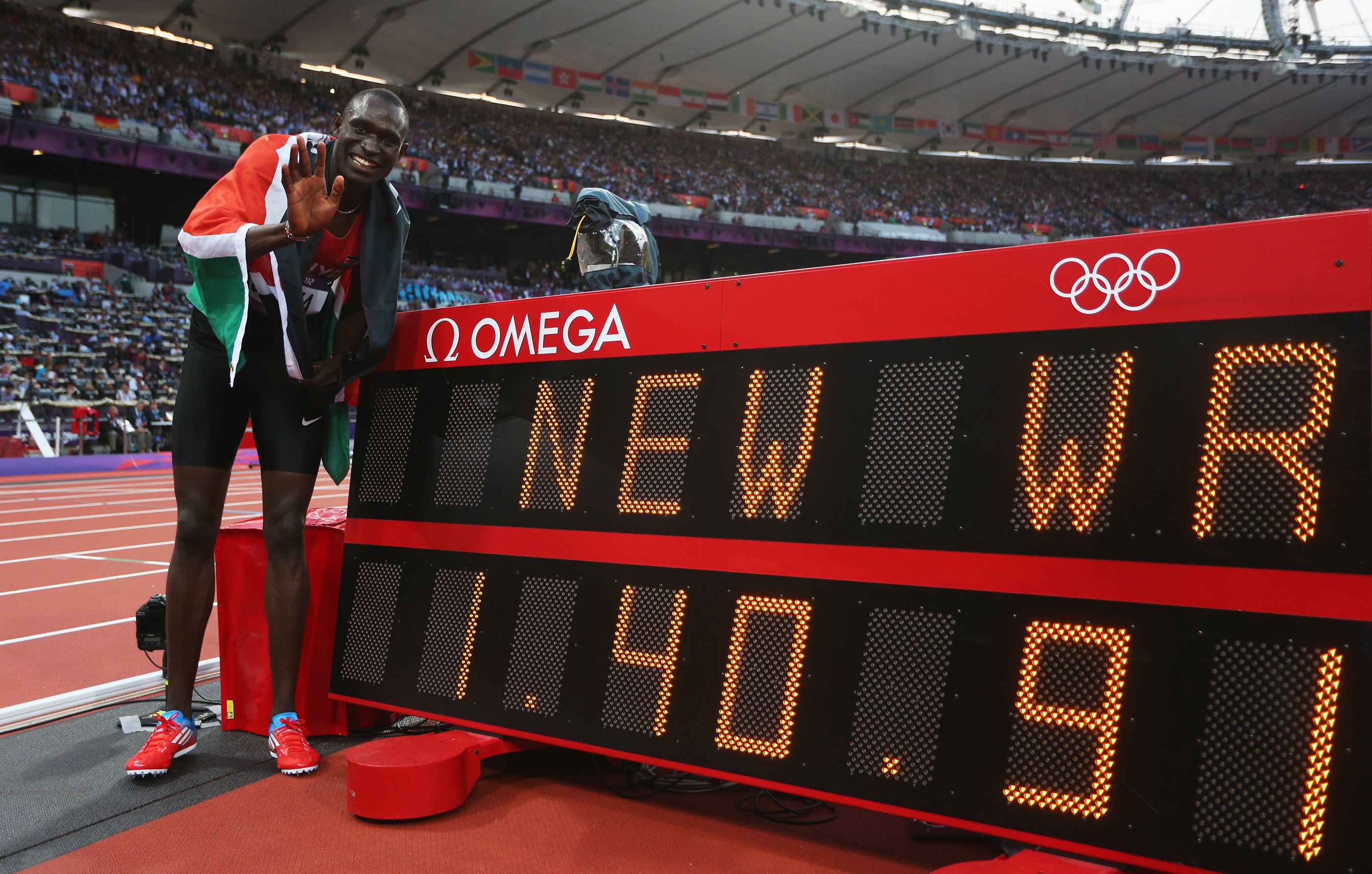 David Rudisha next to his world 800m record figures at the London 2012 Olympic Games