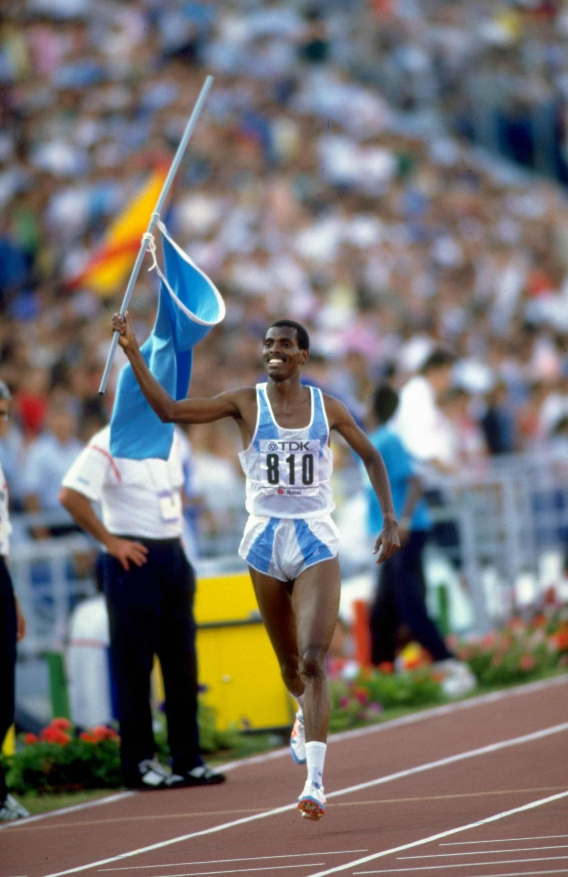 Abdi Bile celebrates after winning the 1500m at the 1987 World Championships in Rome
