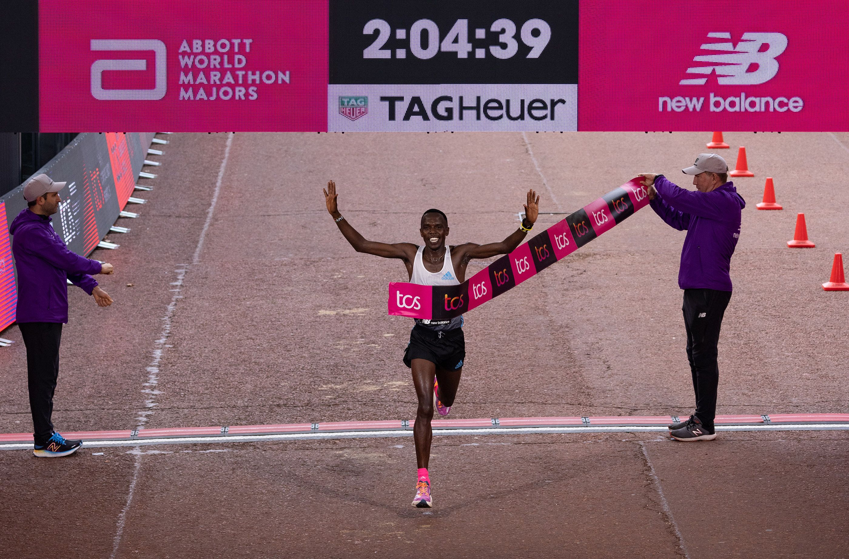 Amos Kipruto celebrates his win at the TCS London Marathon