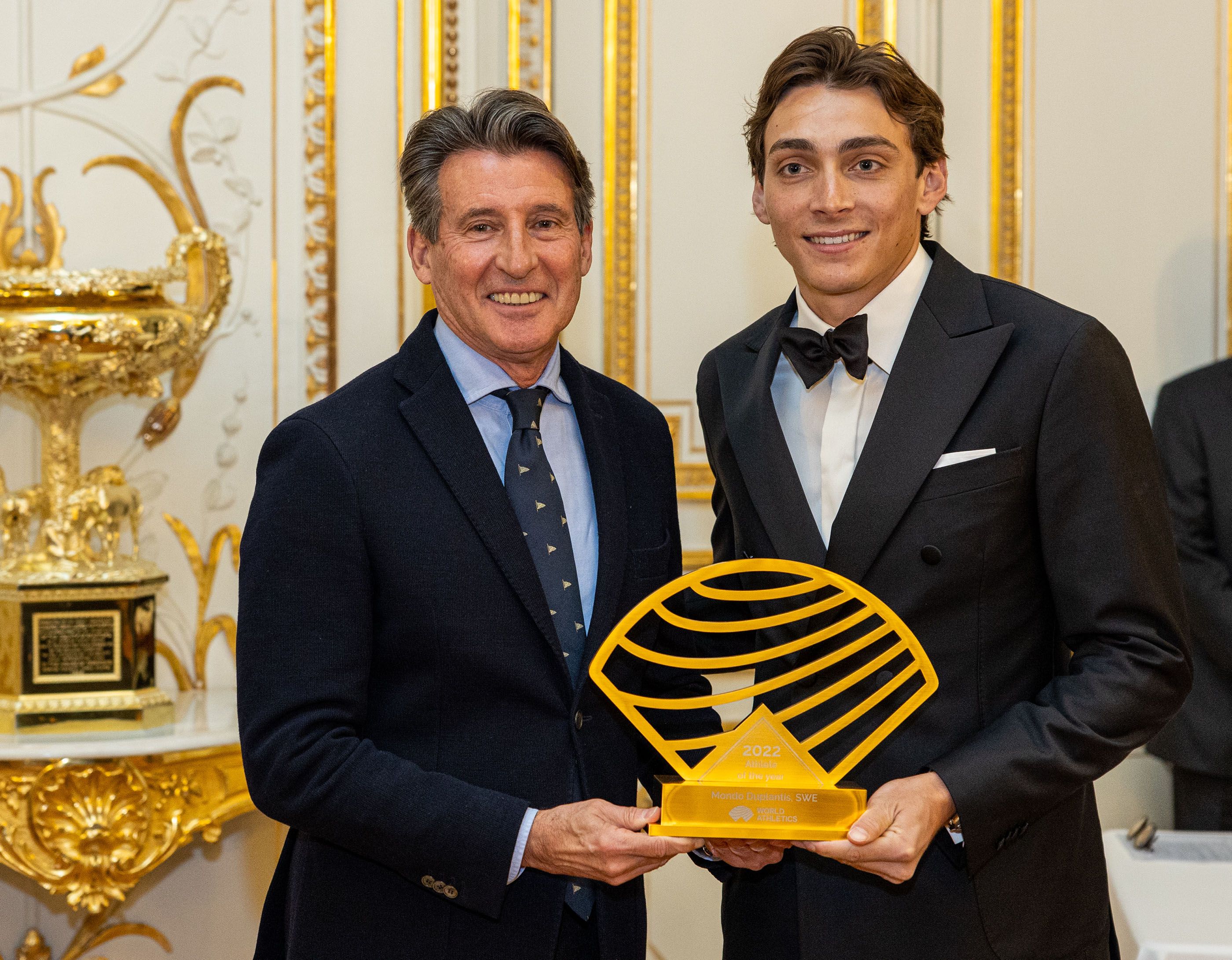 Mondo Duplantis receives his Athlete of the Year award from World Athletics President Sebastian Coe