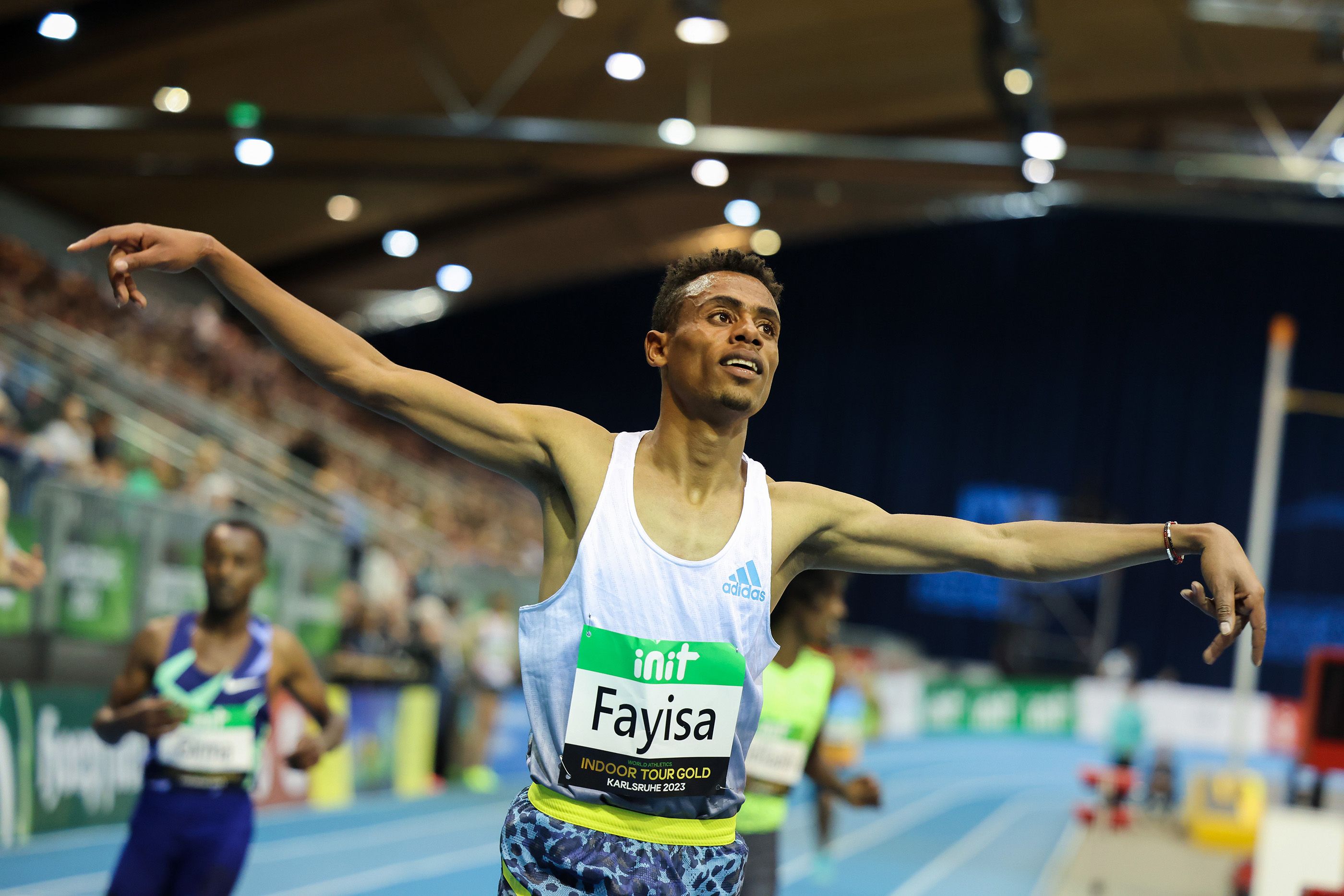 Abdisa Fayisa celebrates his 3000m win at the World Indoor Tour Gold meeting in Karlsruhe