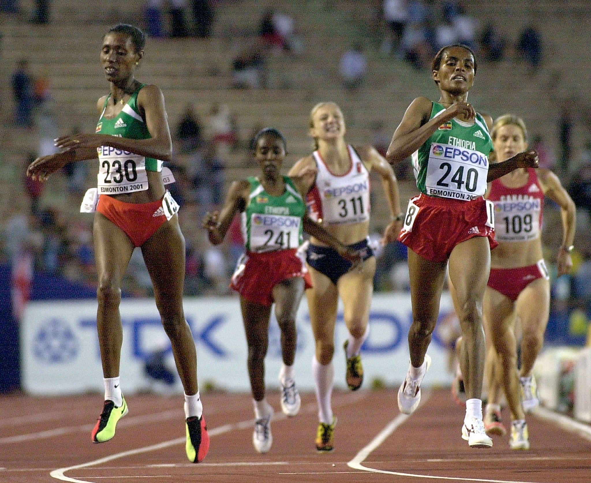 Berhane Adere and winner Deratu Tulu cross the finish line in the 2001 world 10,000m final in Edmonton