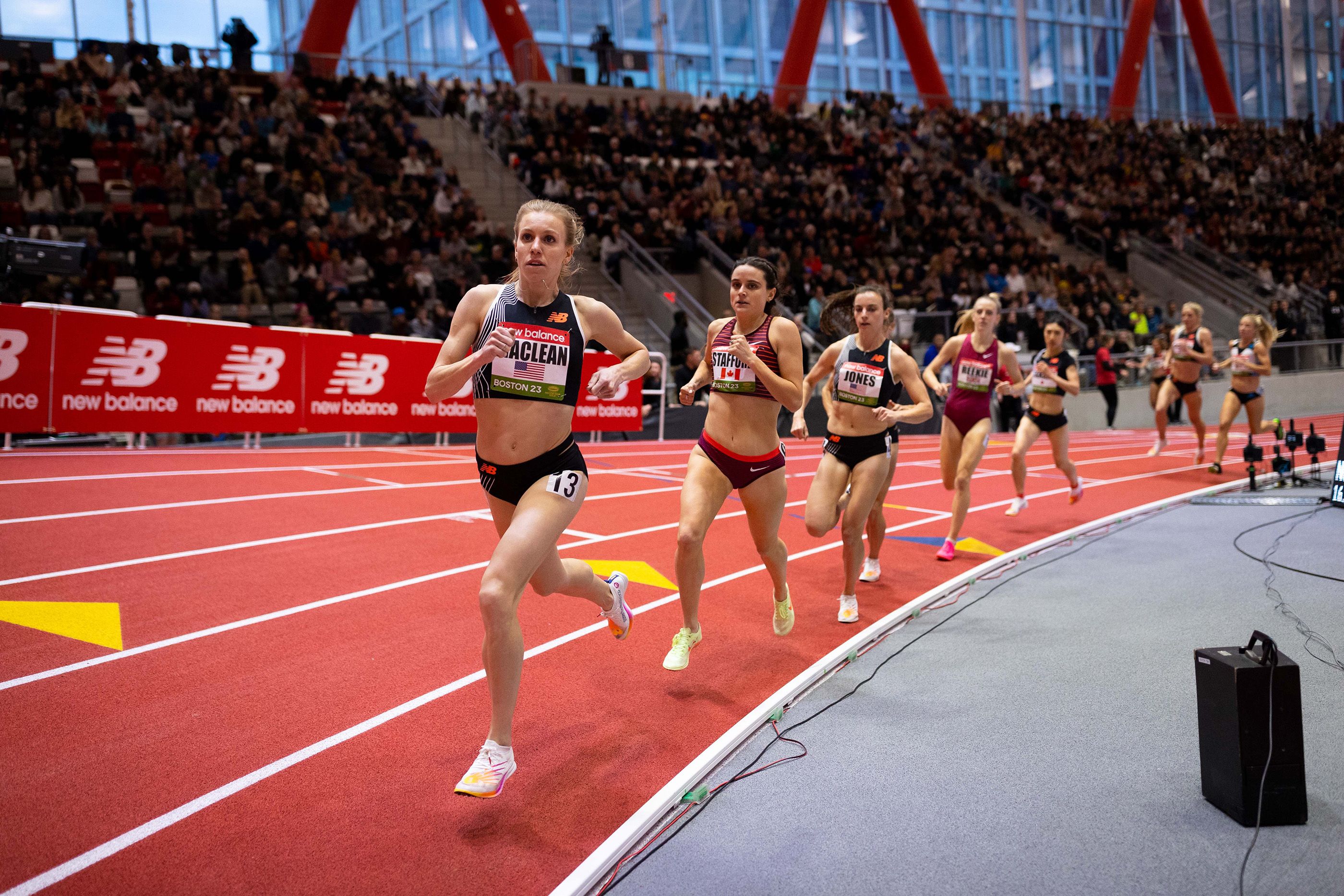 Heather MacLean leads the women's mile in Boston