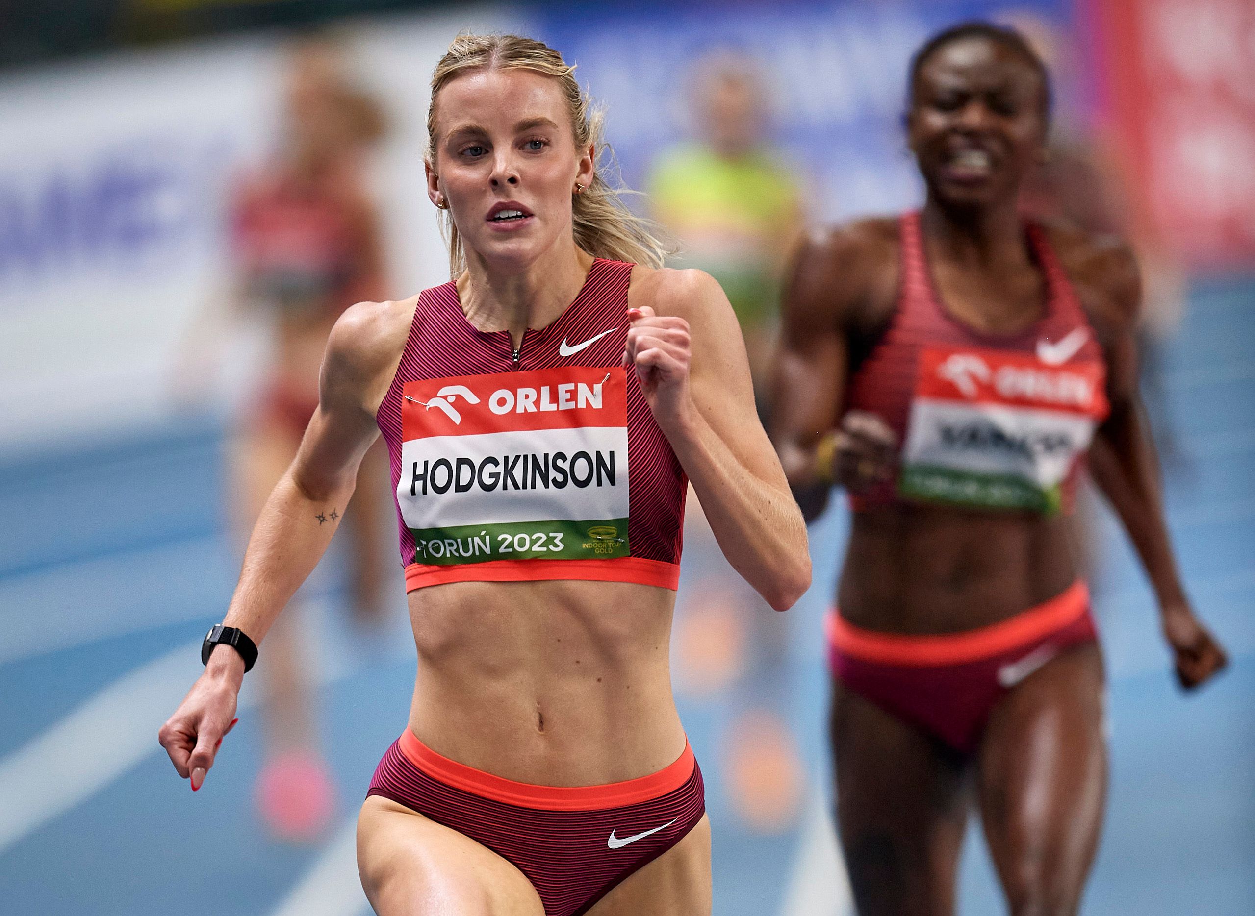Keely Hodgkinson wins the 800m ahead of Noelie Yarigo at the World Indoor Tour Gold meeting in Torun