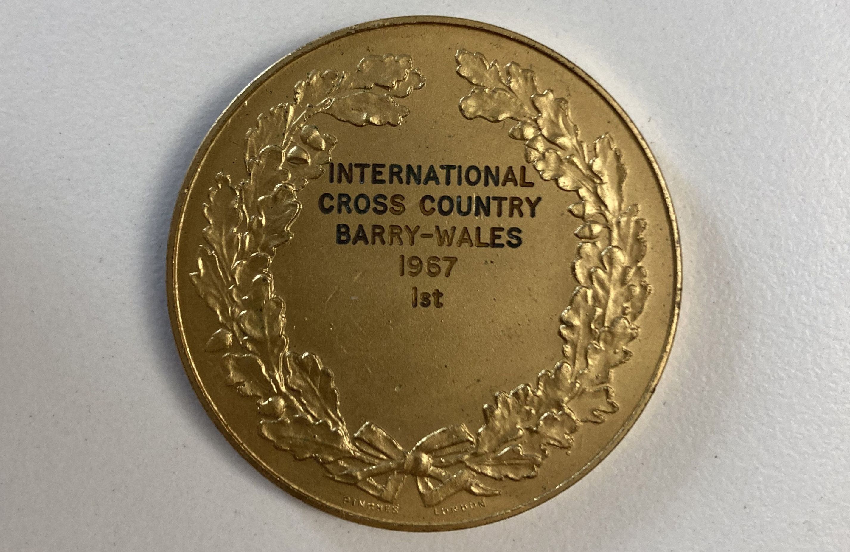 The reverse of Doris Brown Heritage's historic cross country gold medal