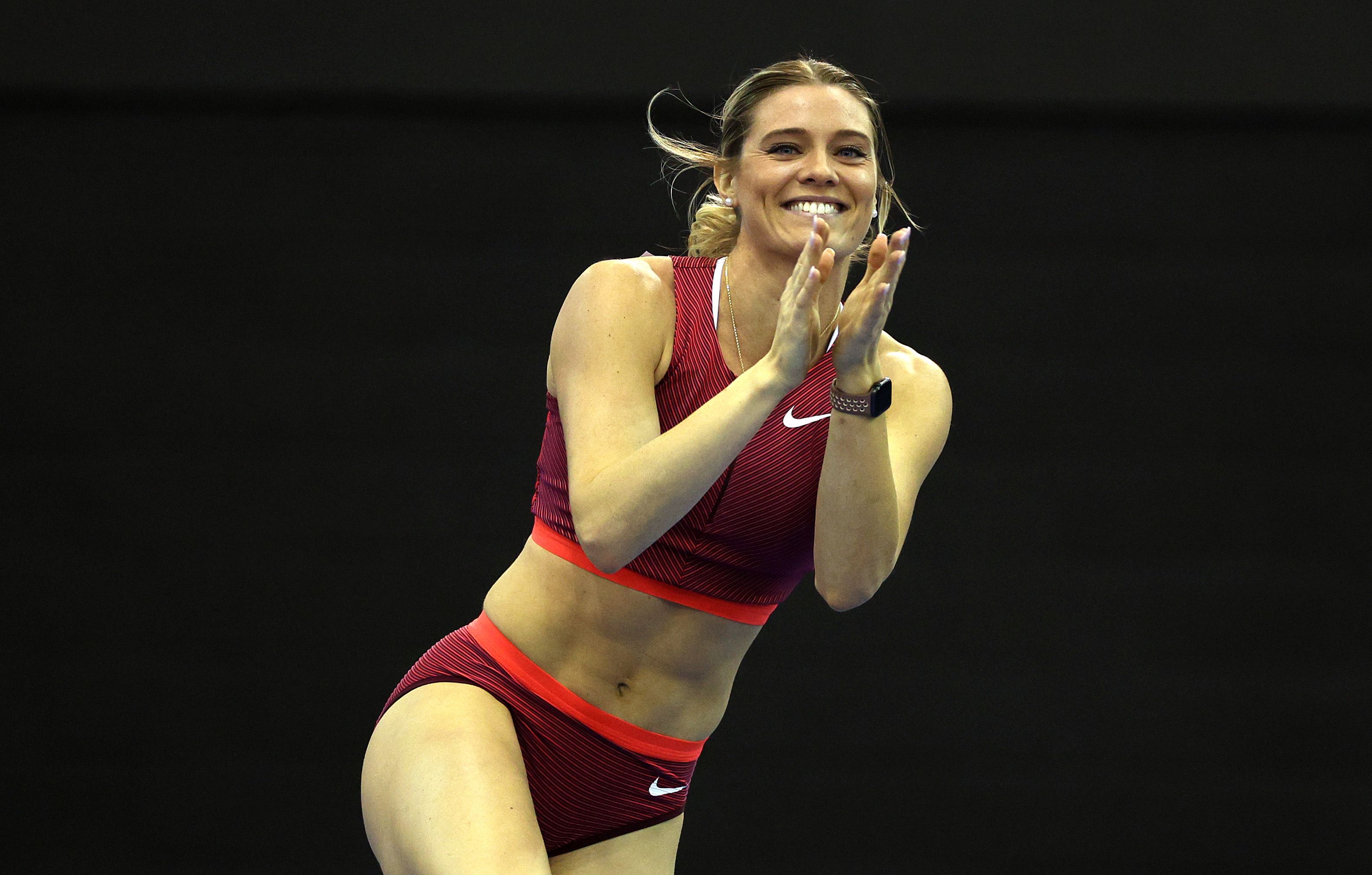 Alysha Newman celebrates her pole vault win in Birmingham