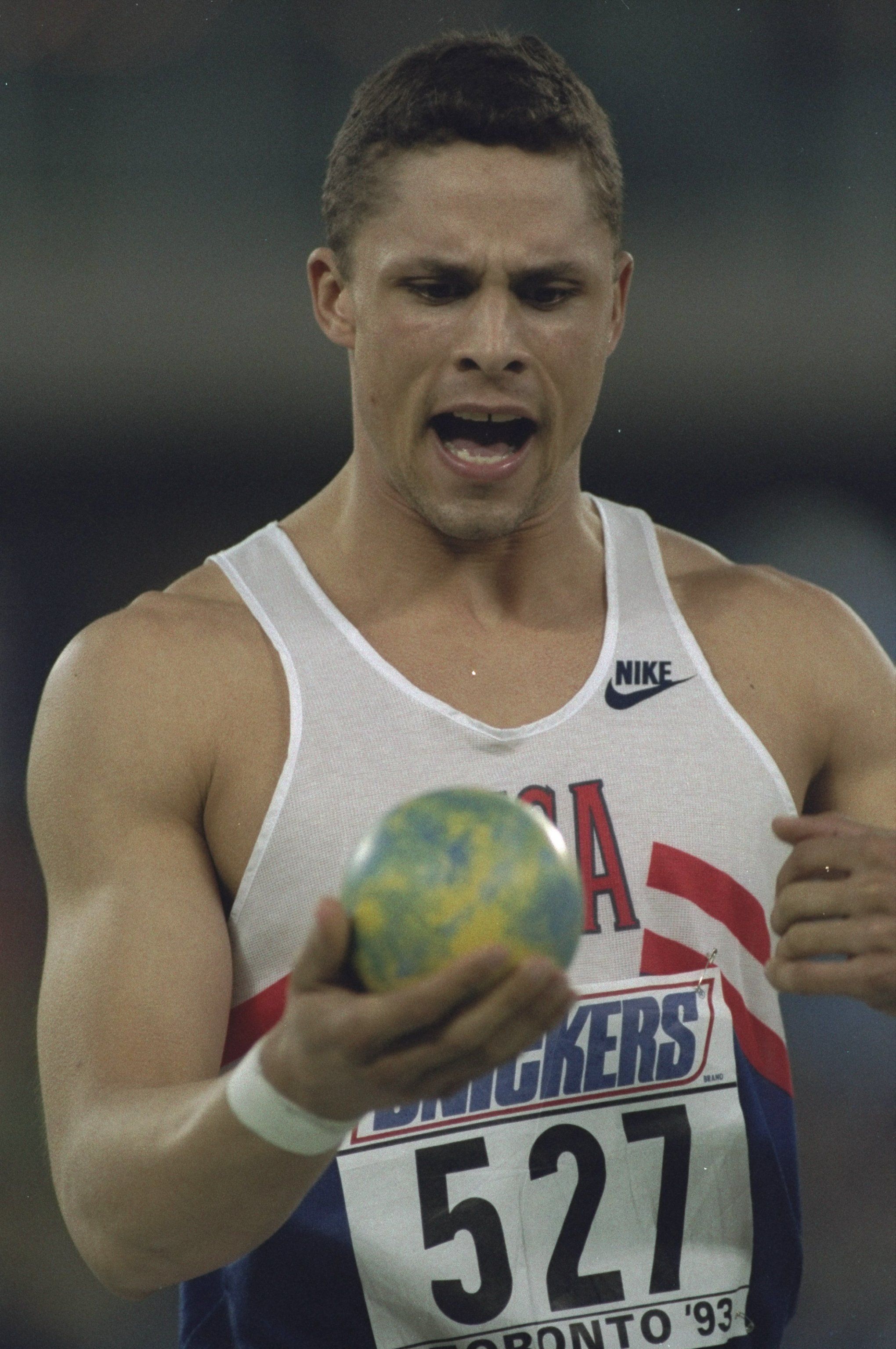 Dan O'Brien in the heptathlon shot put at the 1993 World Indoor Championships