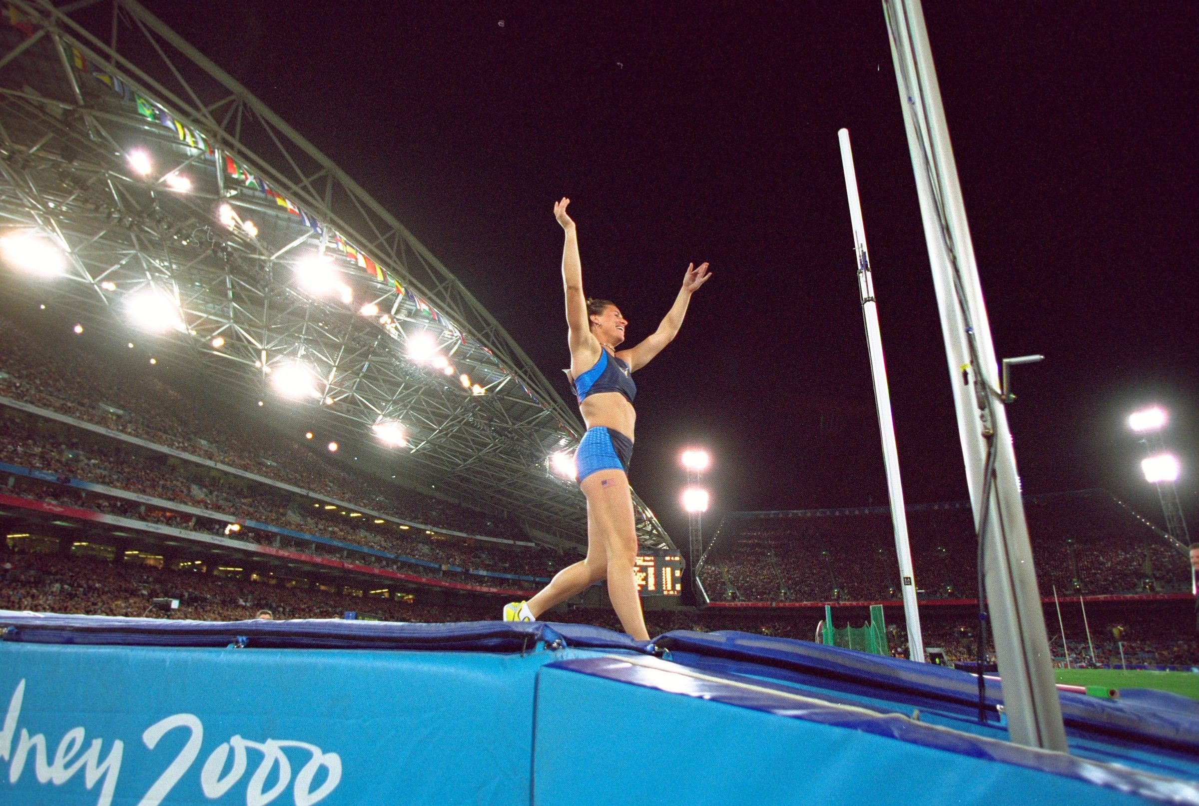 Stacy Dragila celebrates her win at the 2000 Olympics