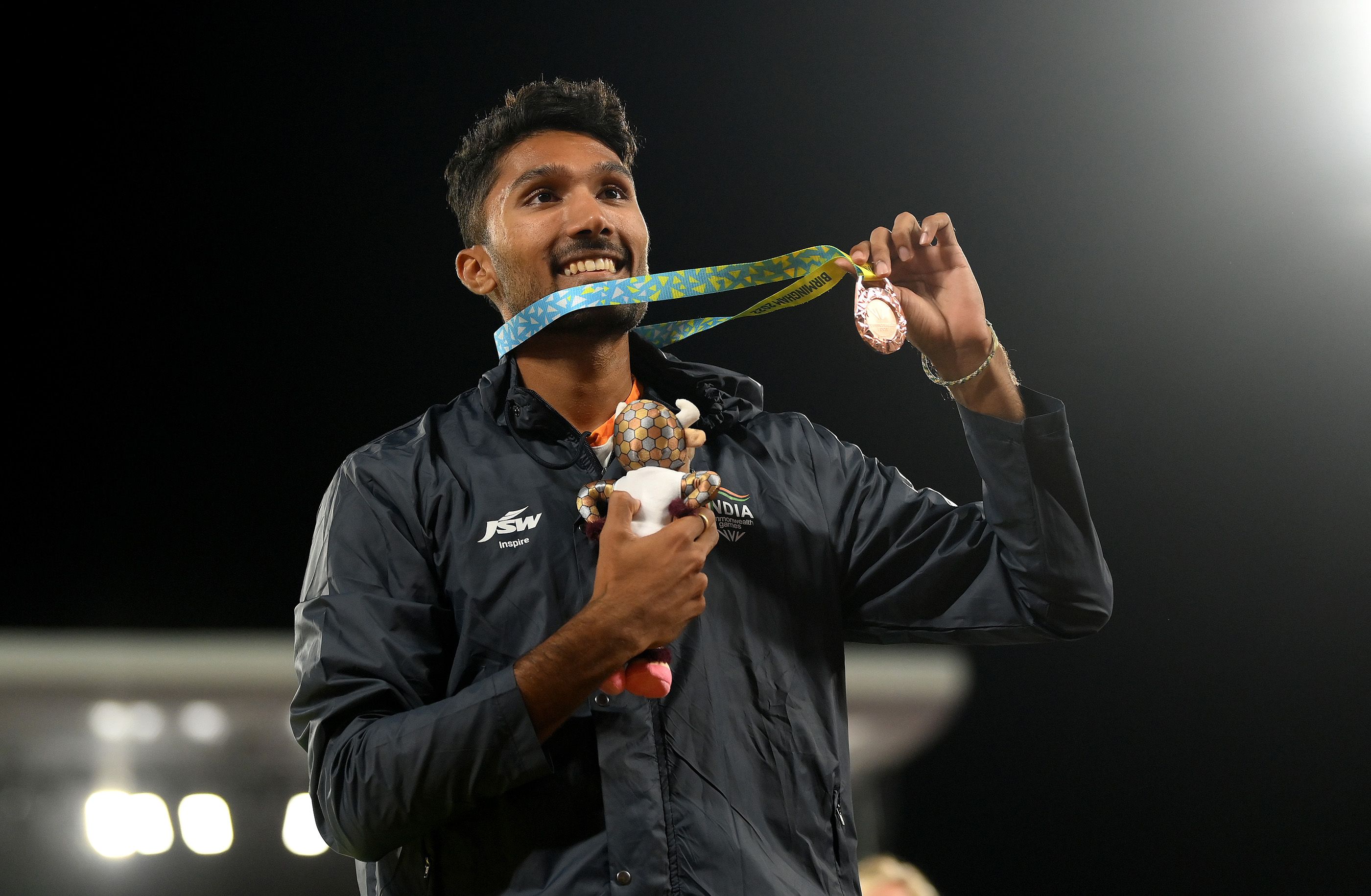 Tejaswin Shankar celebrates his bronze medal at the Commonwealth Games in Birmingham