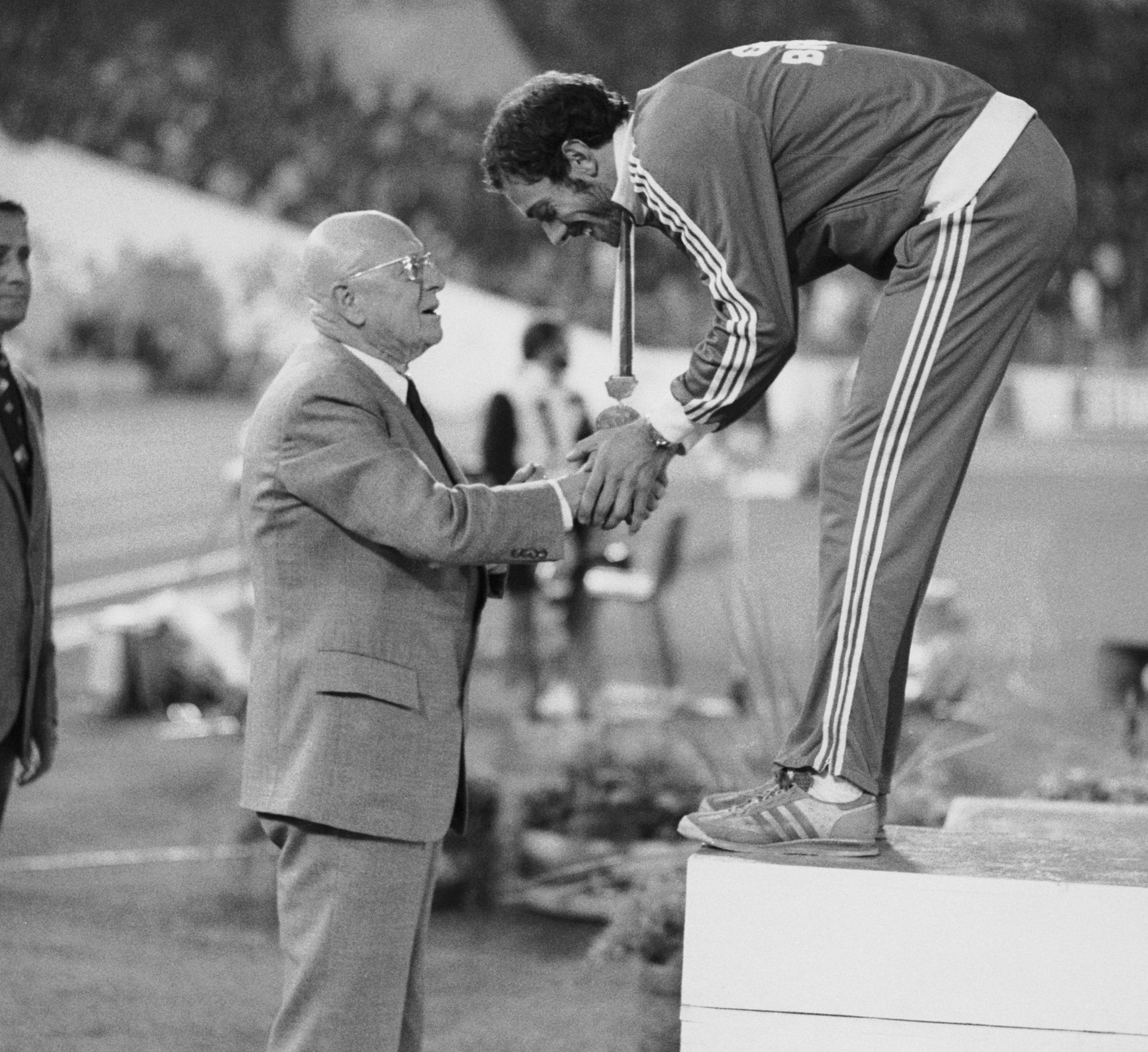 Adriaan Paulen awards Steve Ovett with his 1500m gold medal at the 1978 European Championships in Prague