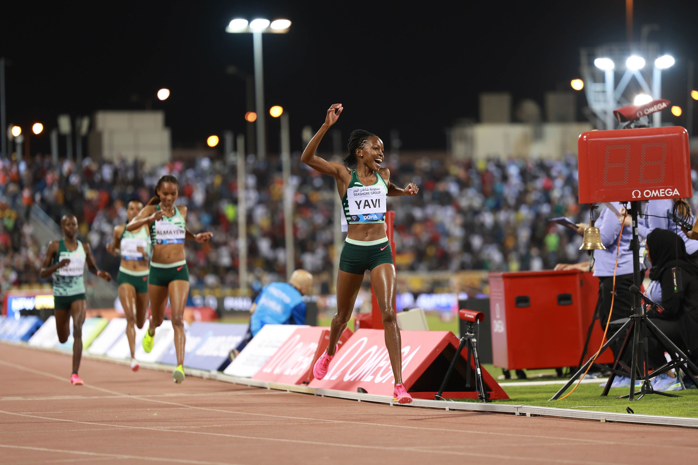 Winfred Yavi celebrates her 3000m steeplechase win at the Doha Diamond League