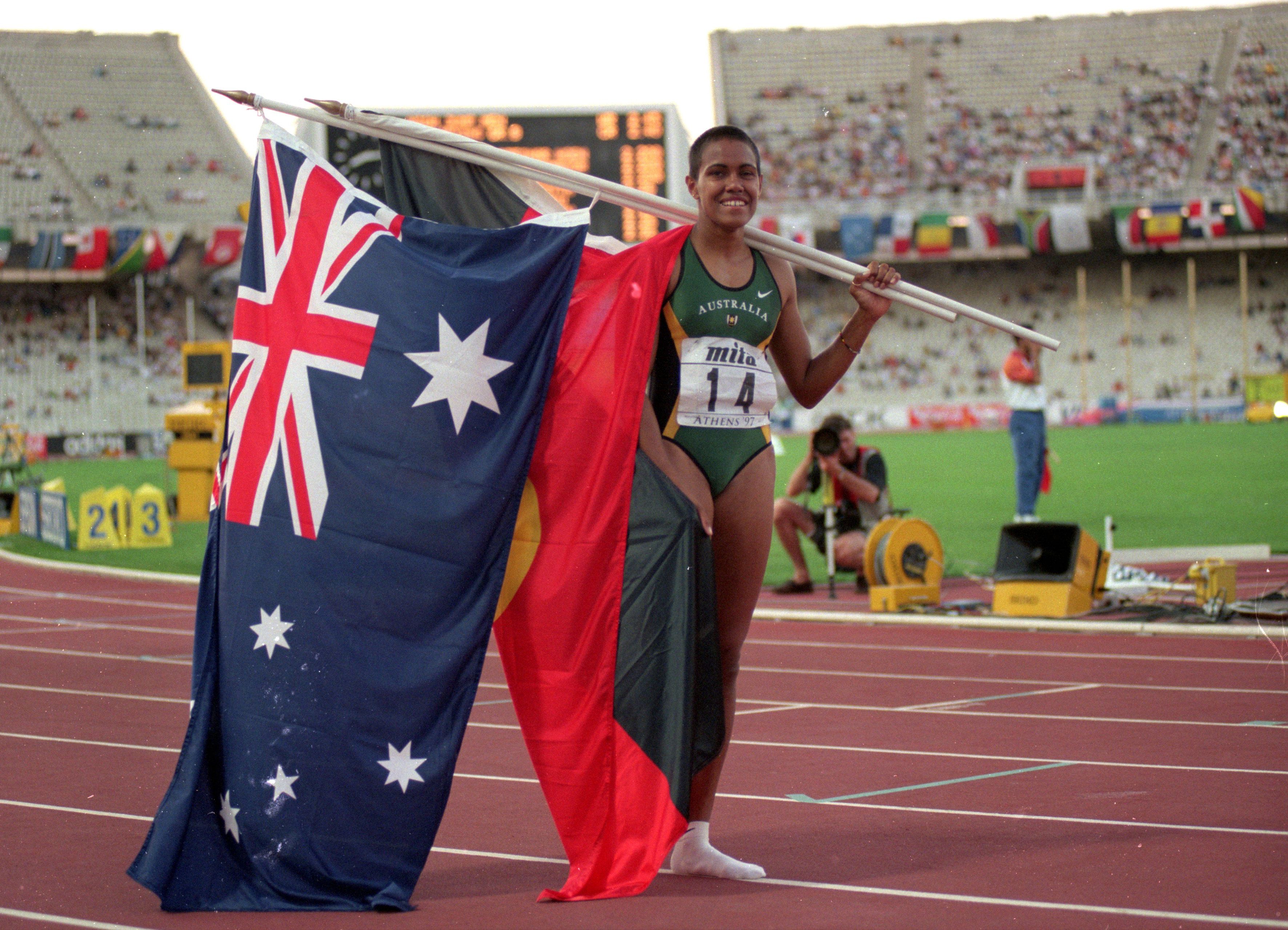 Cathy Freeman celebrates her 400m win at the 1997 World Championships in Athens 
