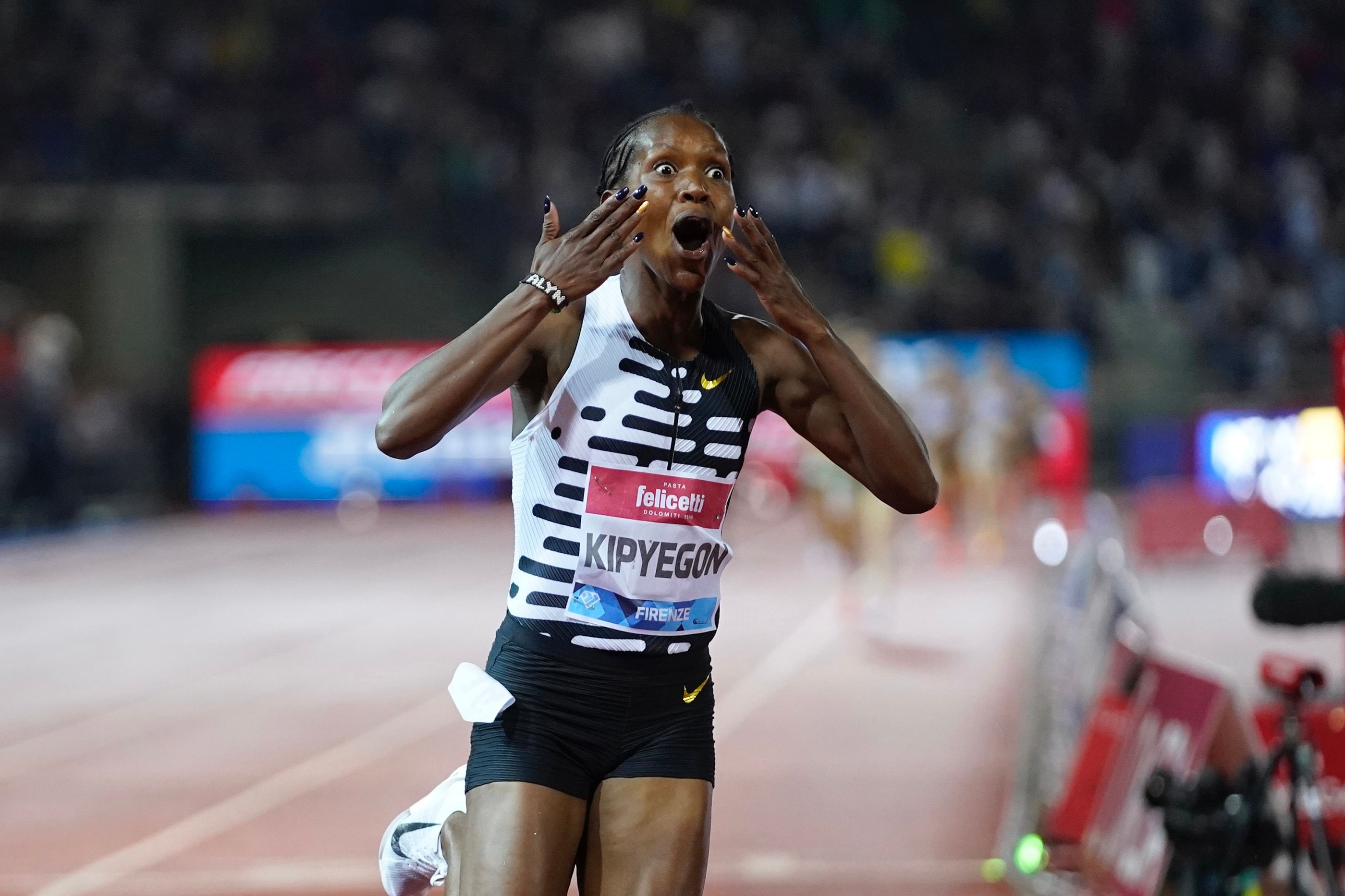 Faith Kipyegon reacts to her world 1500m record in Florence