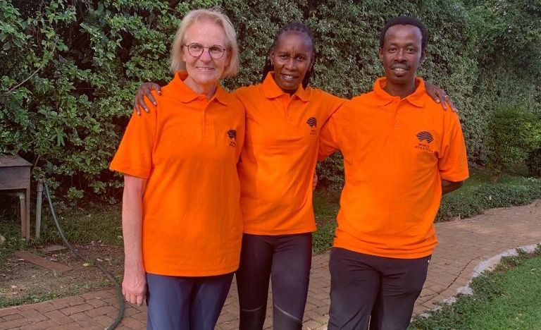 Barbara Moser Mercer, Janeth Jepkosgei Buisenei and Arcade Arakaza, who head the U20 refugee programme