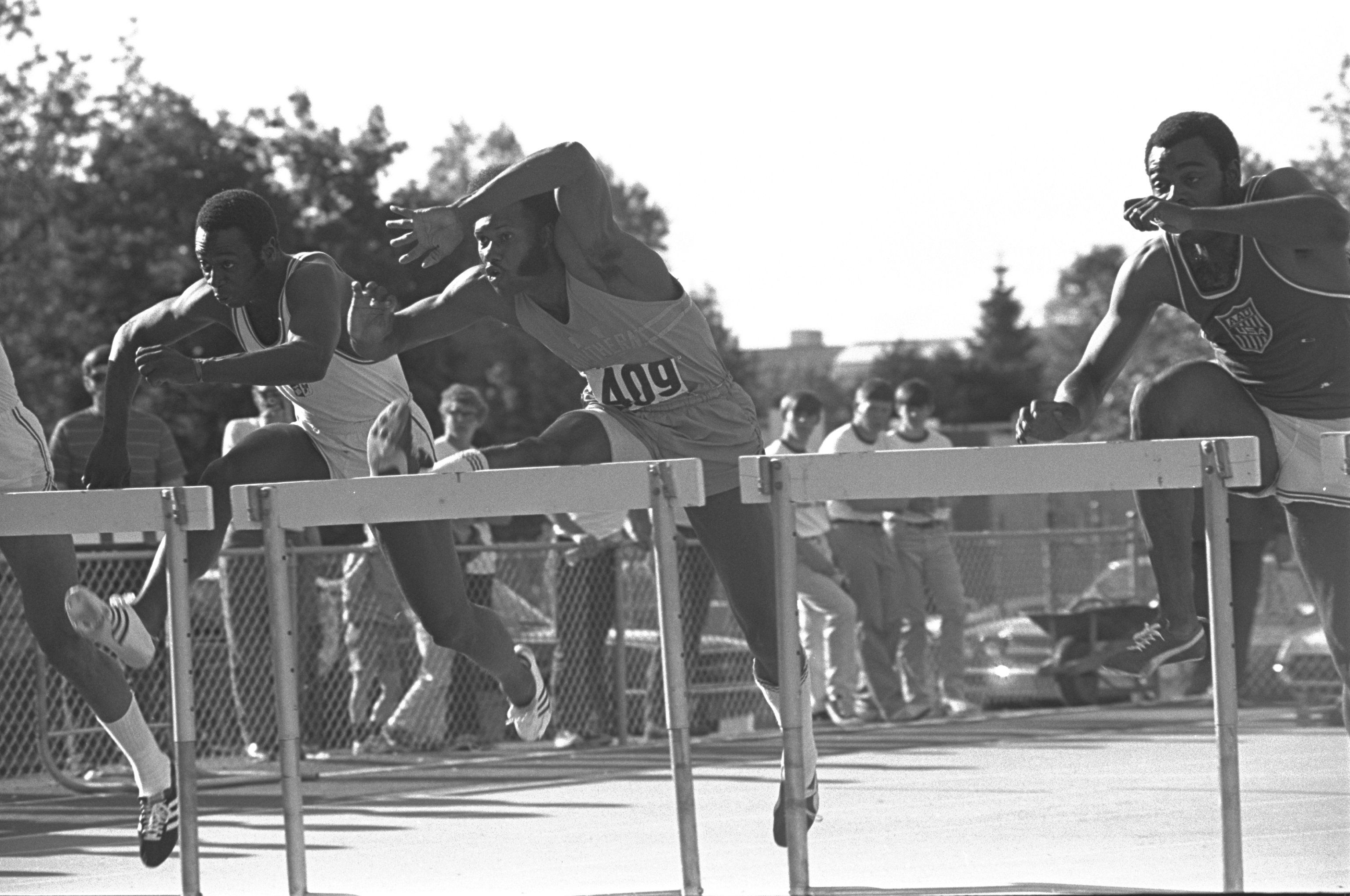 Rod Milburn (409) competes at the AAU Championships in Eugene