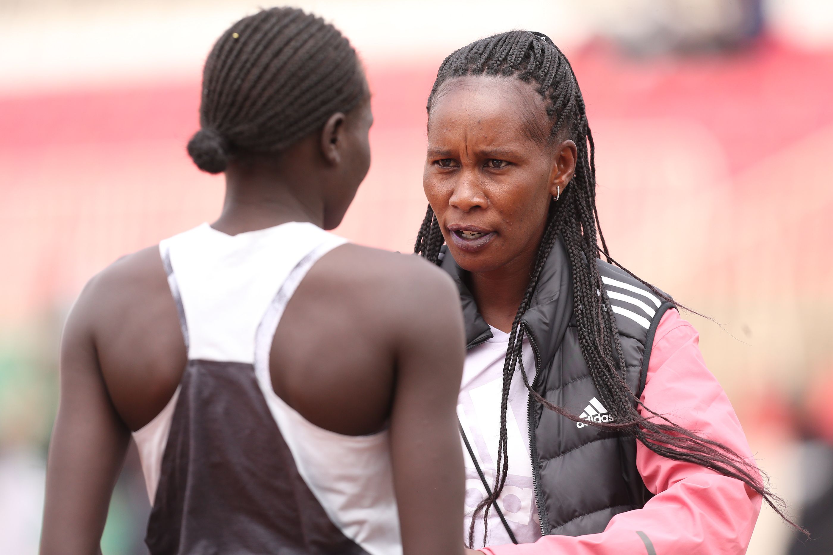 Perina Lokure Nakang with coach Janeth Jepkosgei