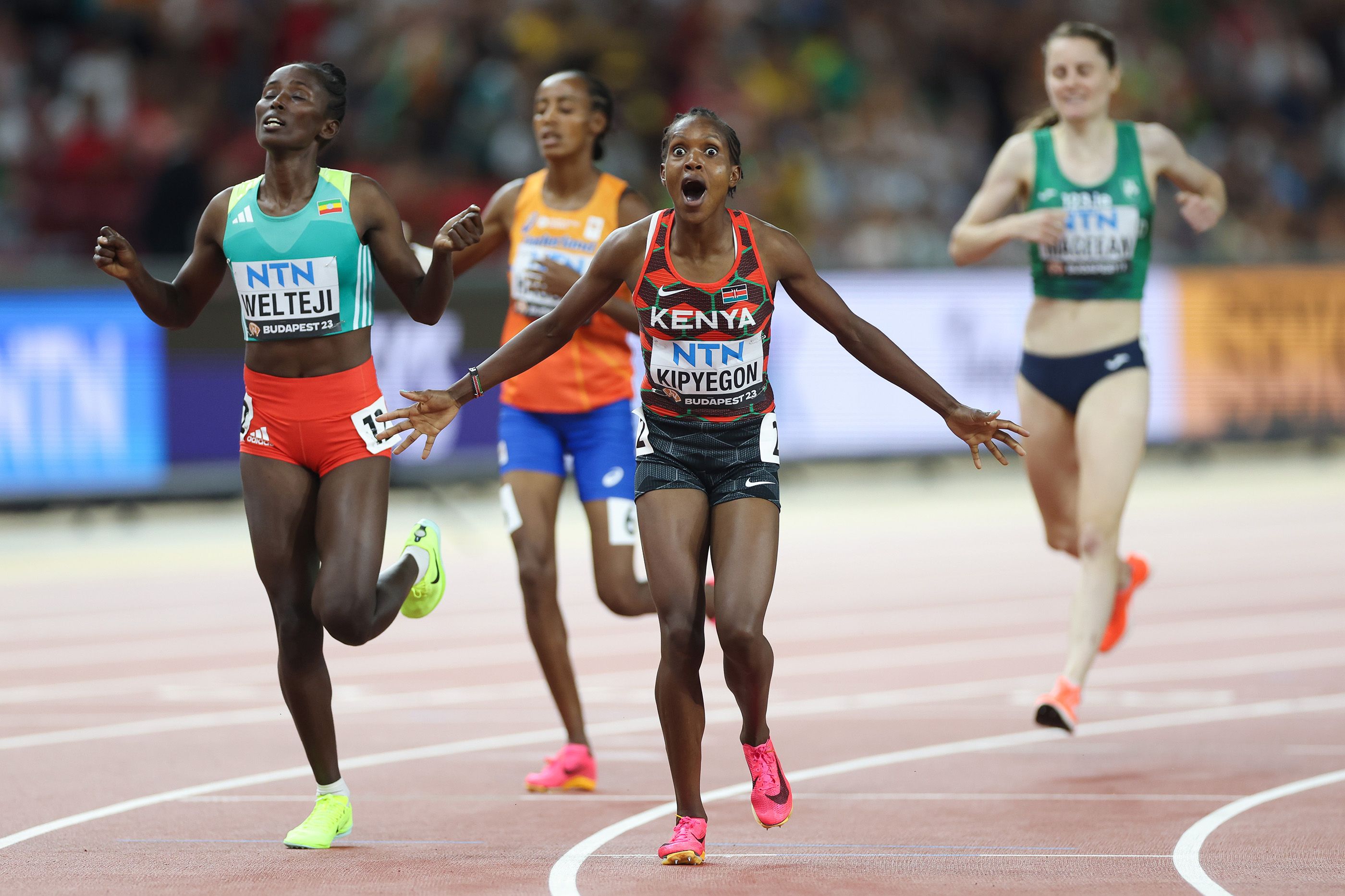 Faith Kipyegon celebrates her 1500m win in Budapest