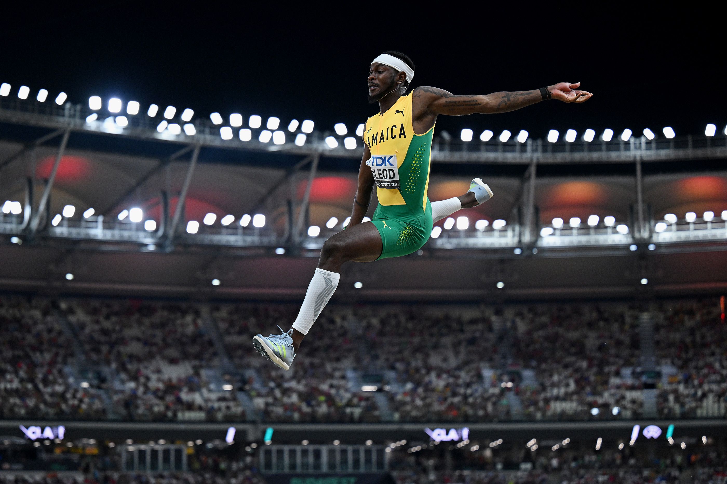 Carey McLeod in long jump action in Budapest