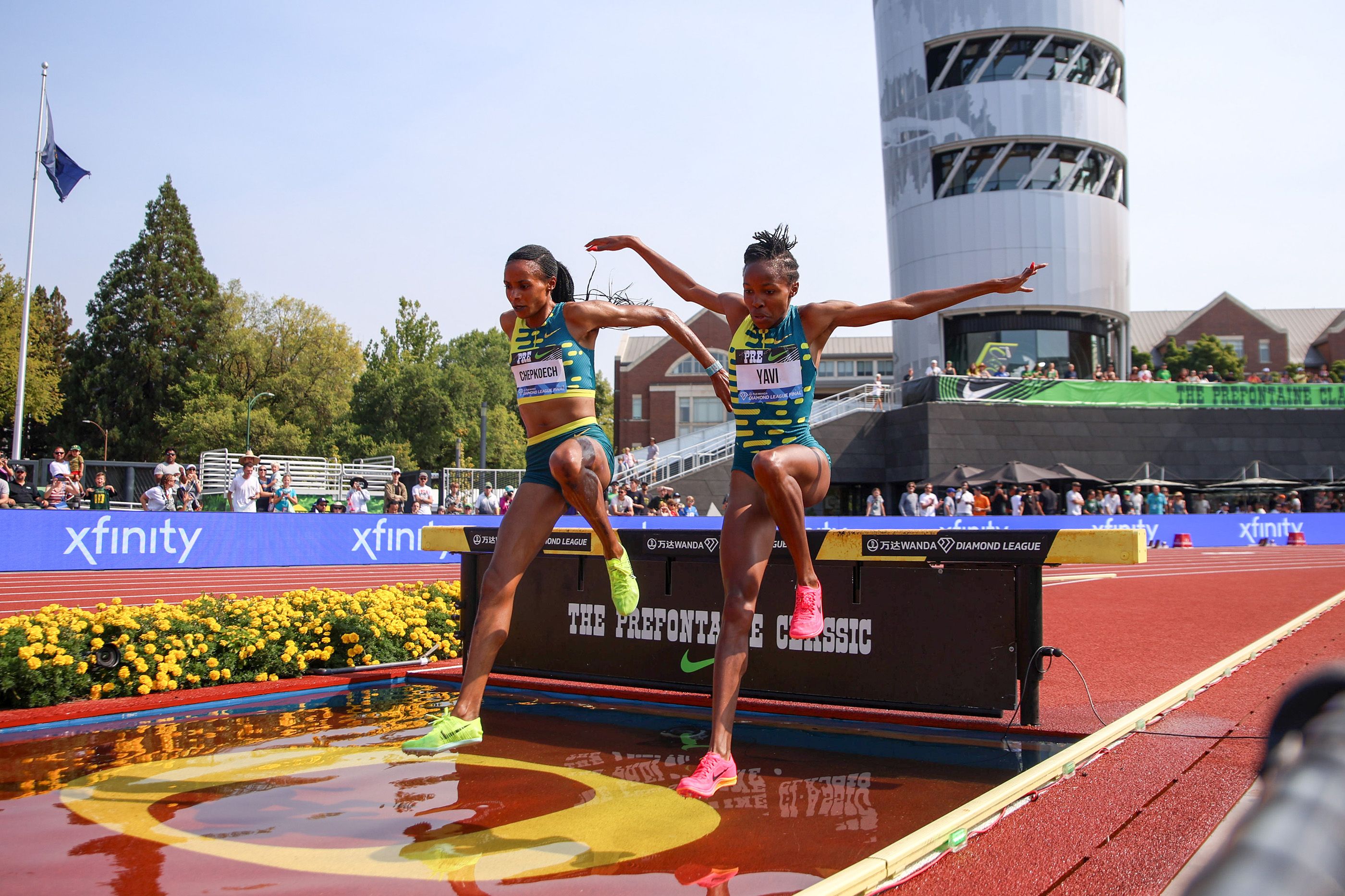 Beatrice Chepkoech and Winfred Yavi battle in the 3000m steeplechase in Eugene