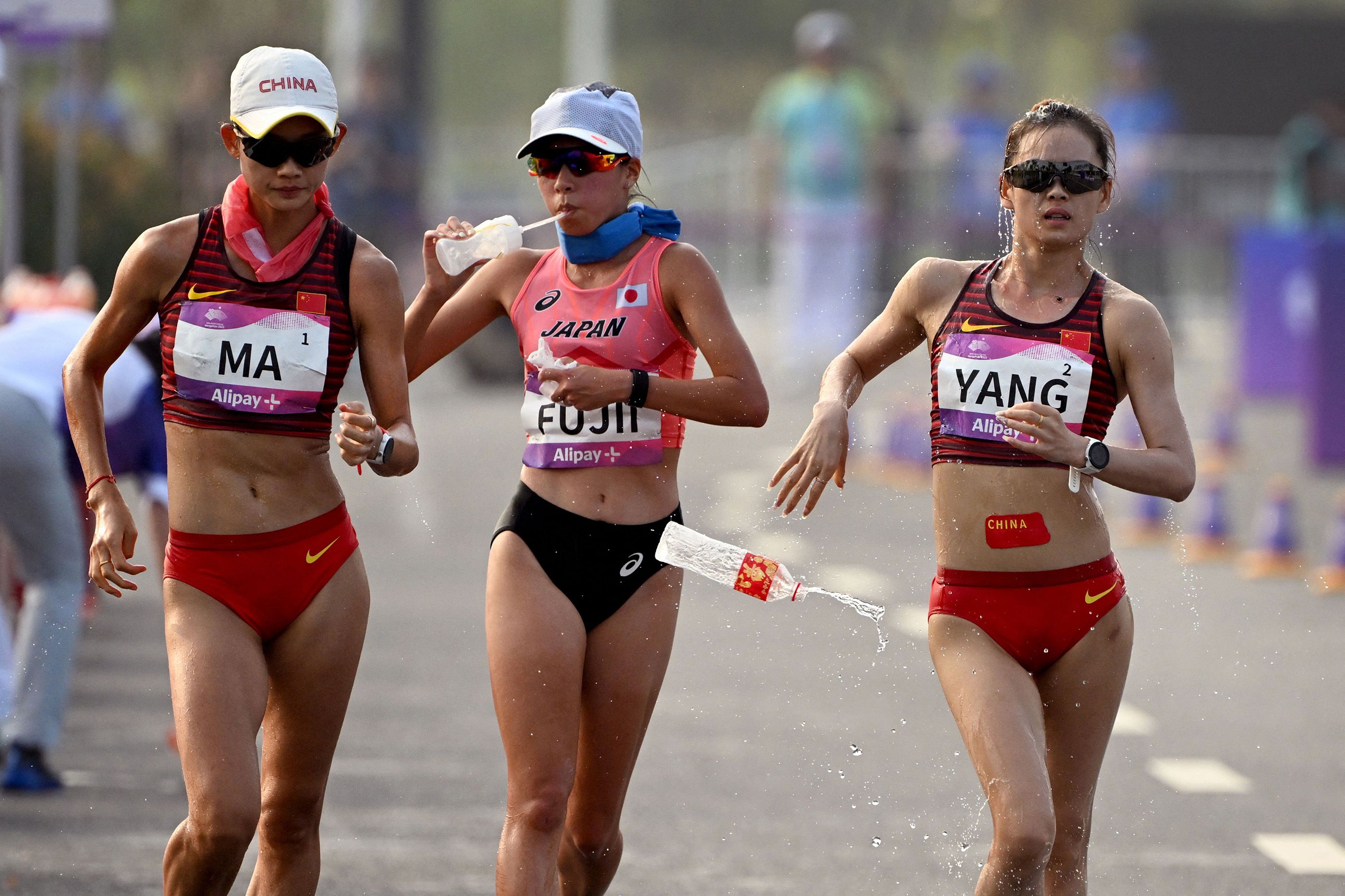 Ma Zhenxia, Nanako Fujii and Yang Jiayu in the 20km race walk in Hangzhou