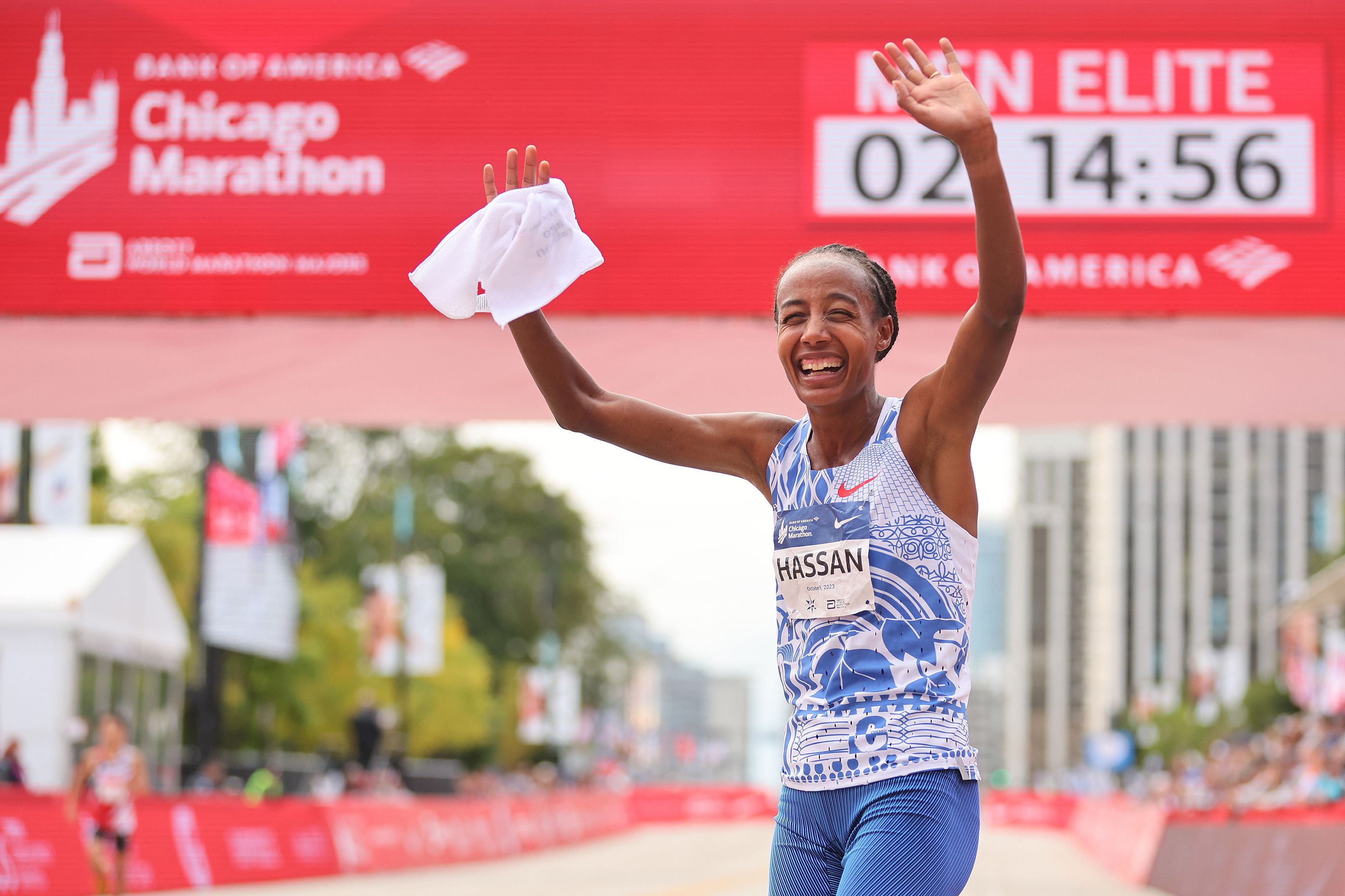 Sifan Hassan celebrates her winning 2:13:44 run in Chicago
