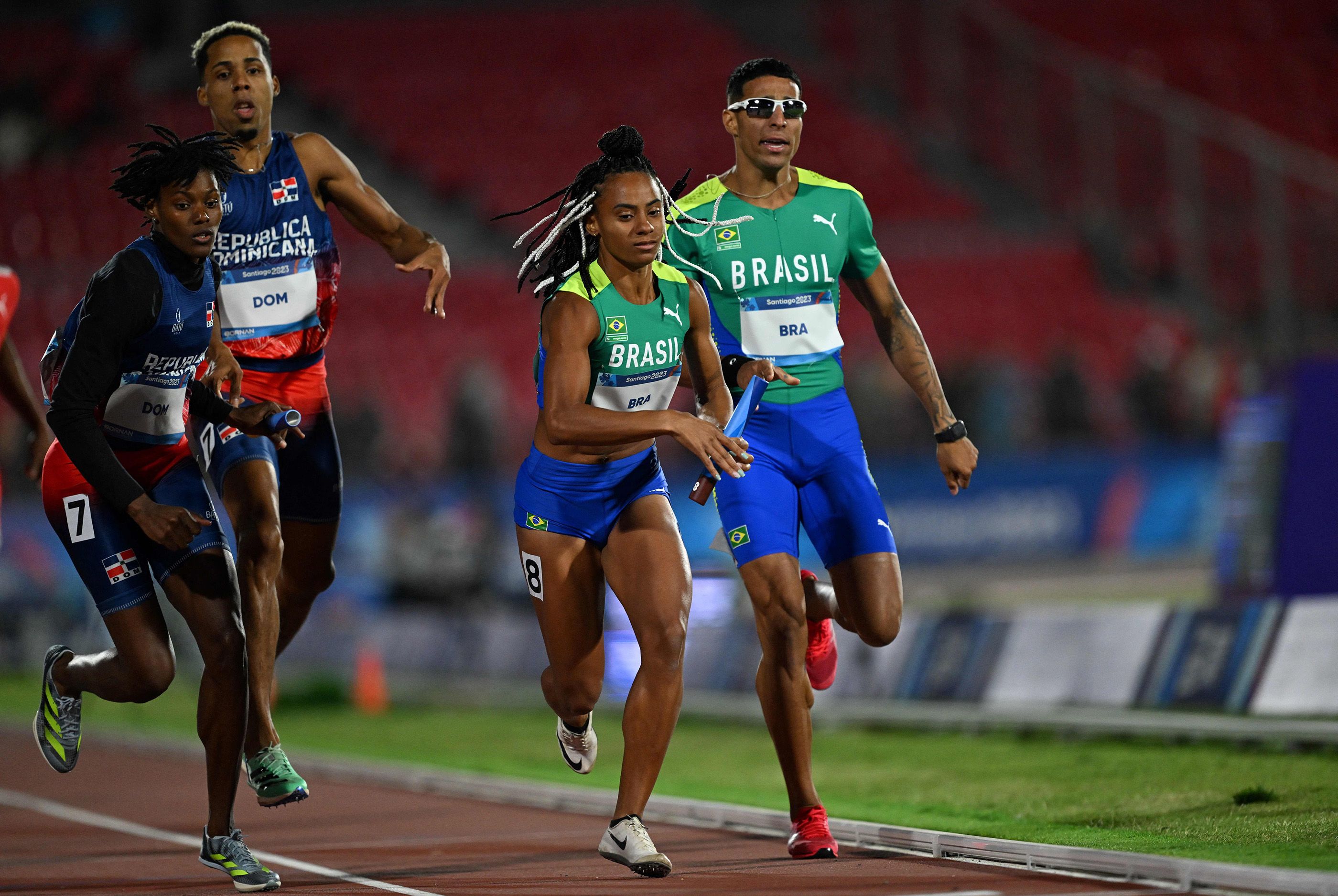 Dominican Republic, anchored by Marileidy Paulino, and Brazil compete in the mixed 4x400m