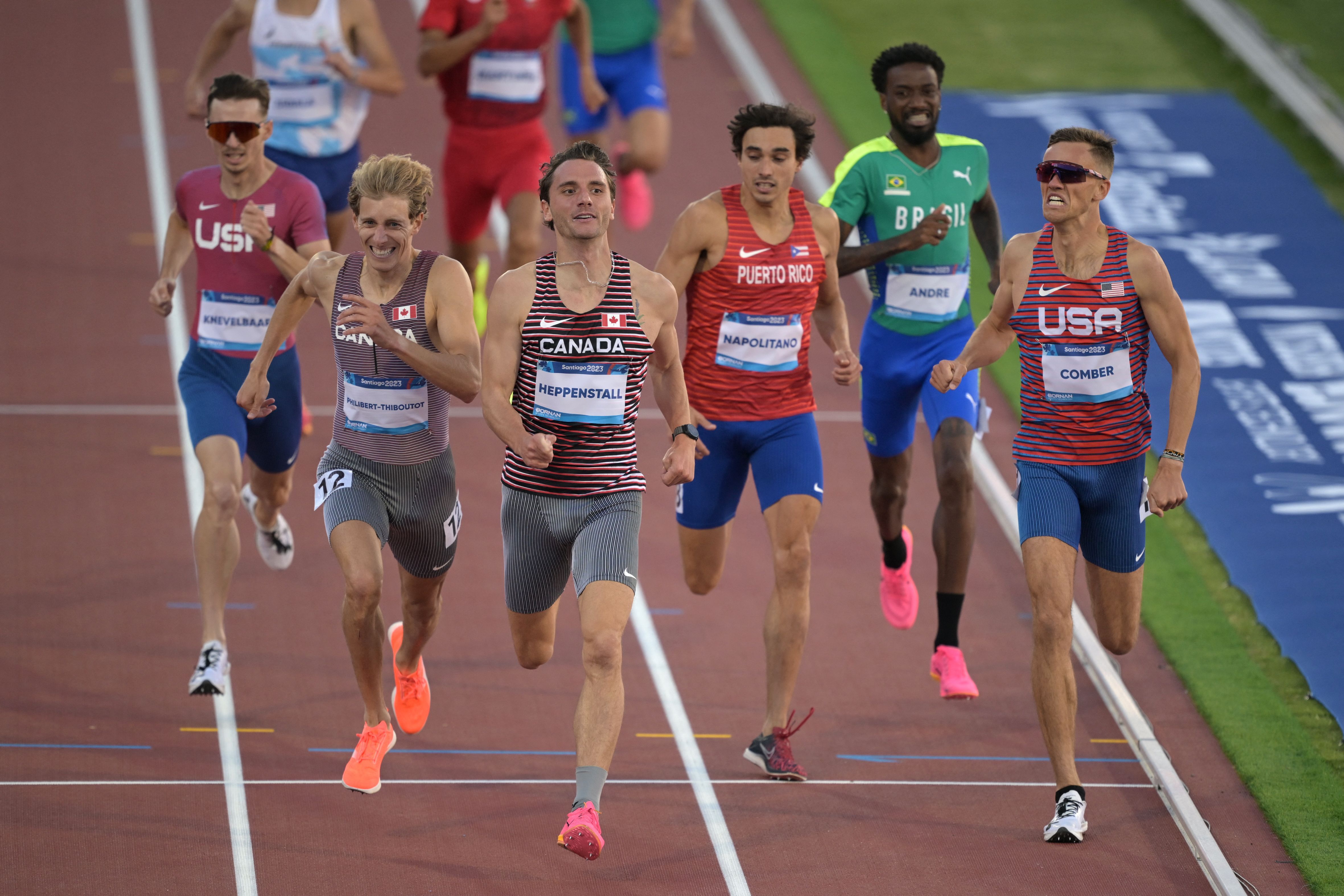 Charles Philibert-Thiboutot and Robert Joseph Heppenstall battle for the 5000m title in Santiago de Chile