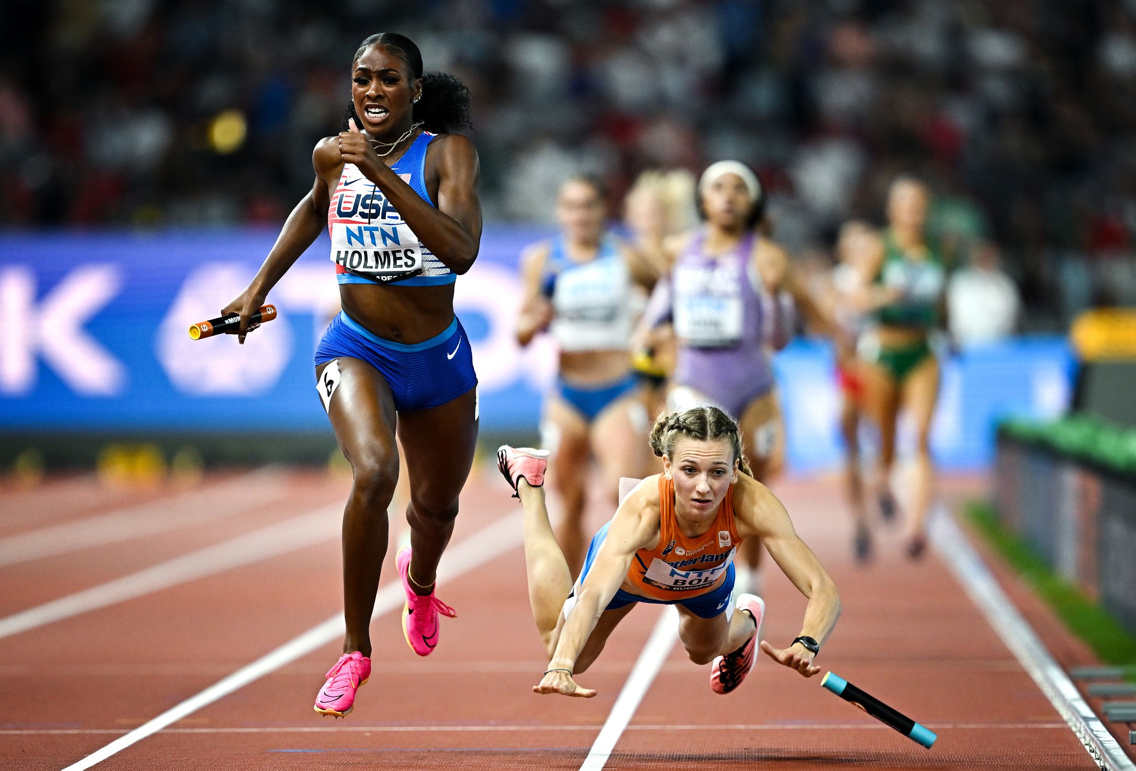 Photograph of the Year finalist - Alexis Holmes and Femke Bol in the mixed 4x400m in Budapest