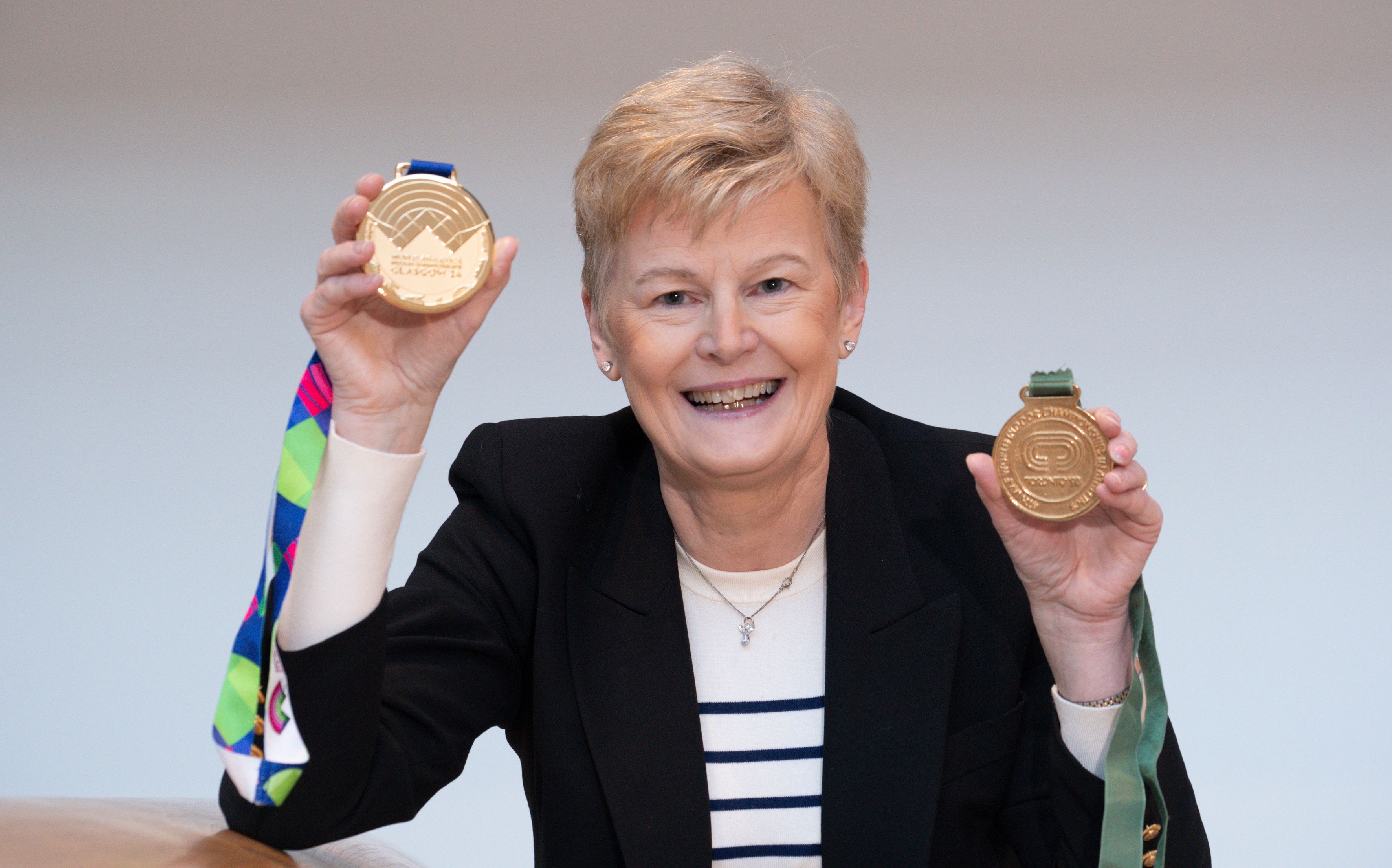 Yvonne Murray-Mooney with world indoor gold medals from 1993 and 2024