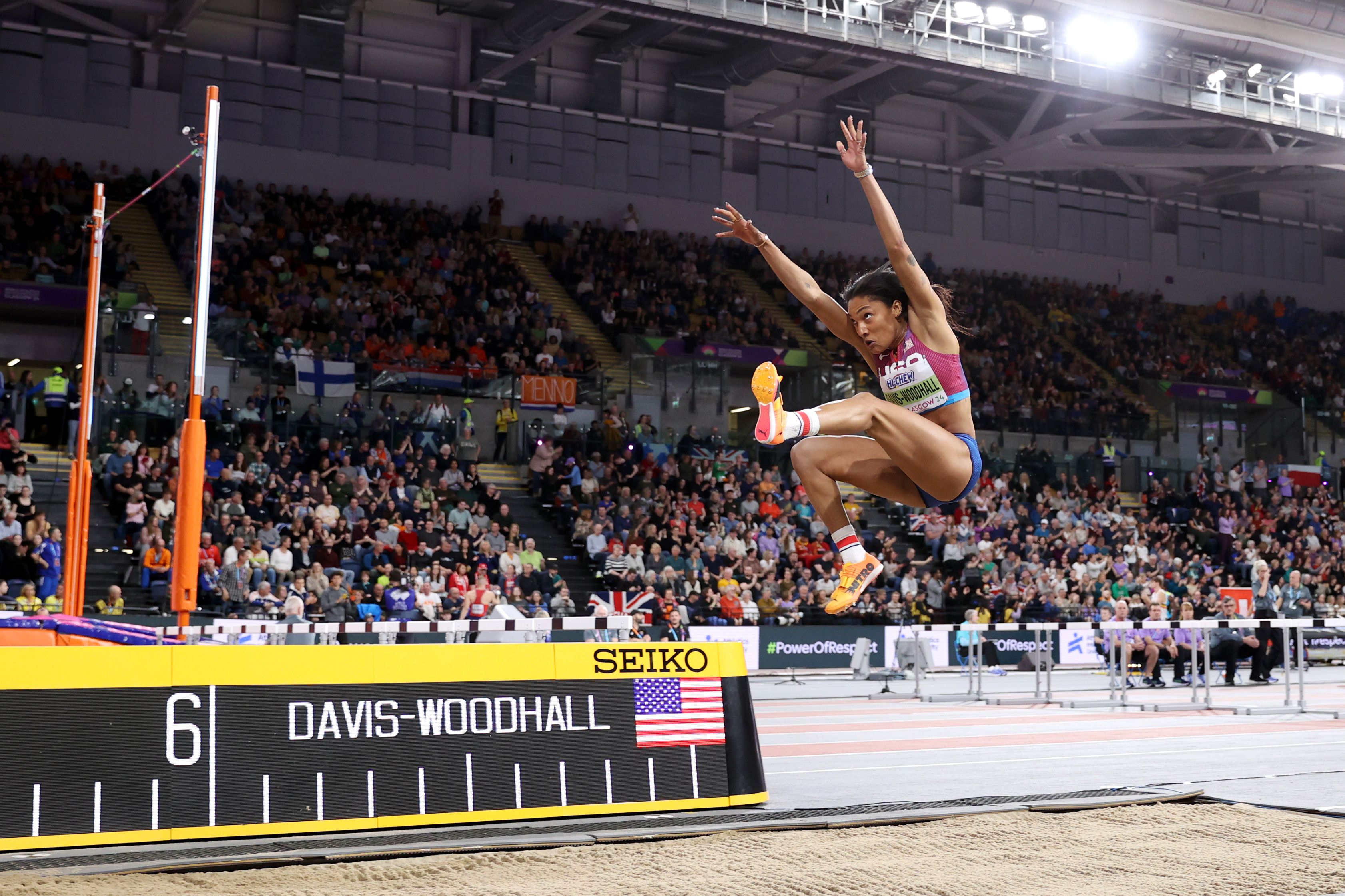 Tara Davis-Woodhall soars to the world indoor long jump title in Glasgow