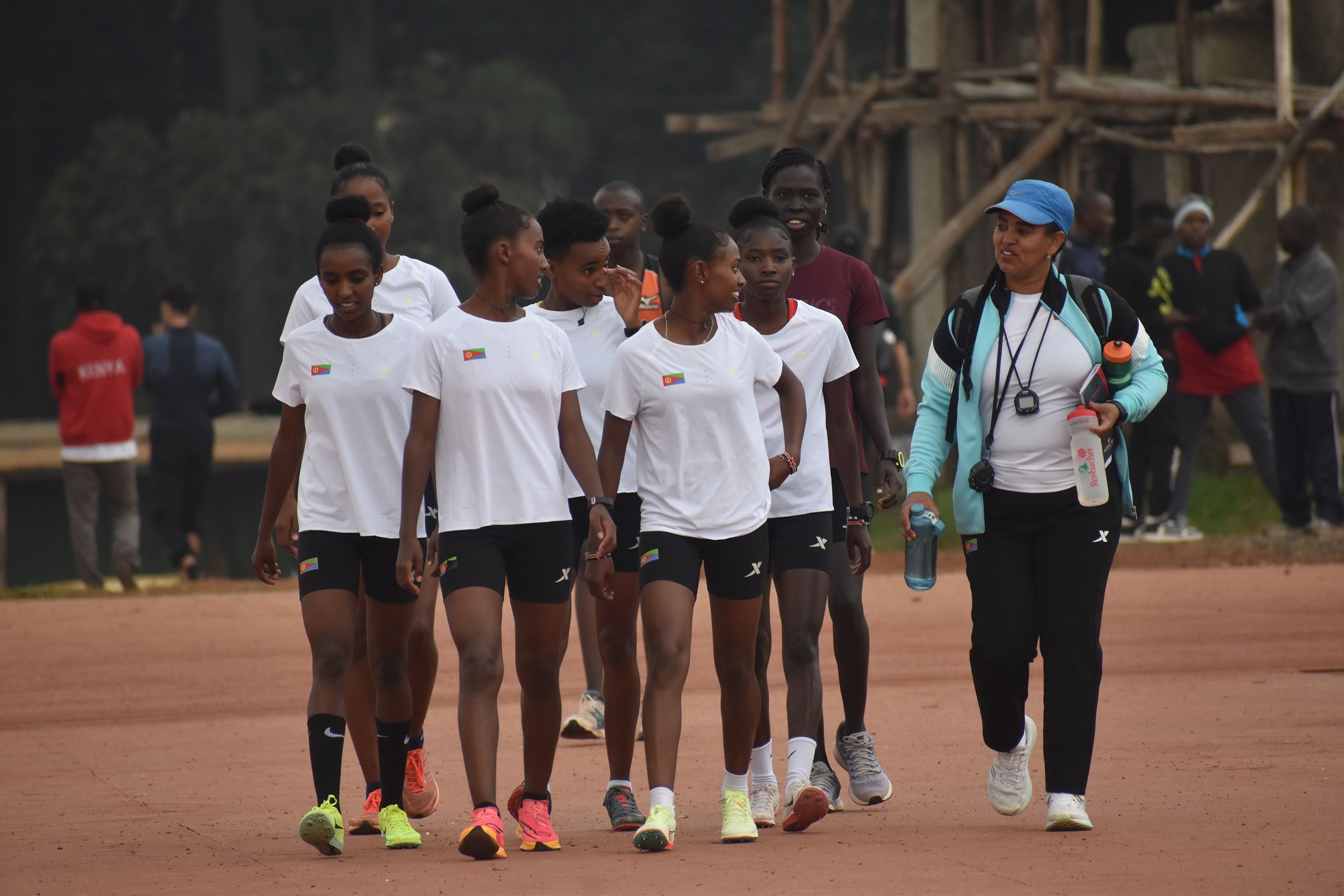 Sprinter turned coach Tesfagebriel Shewit leads her athletes to training at Kip Keino Stadium in Eldoret