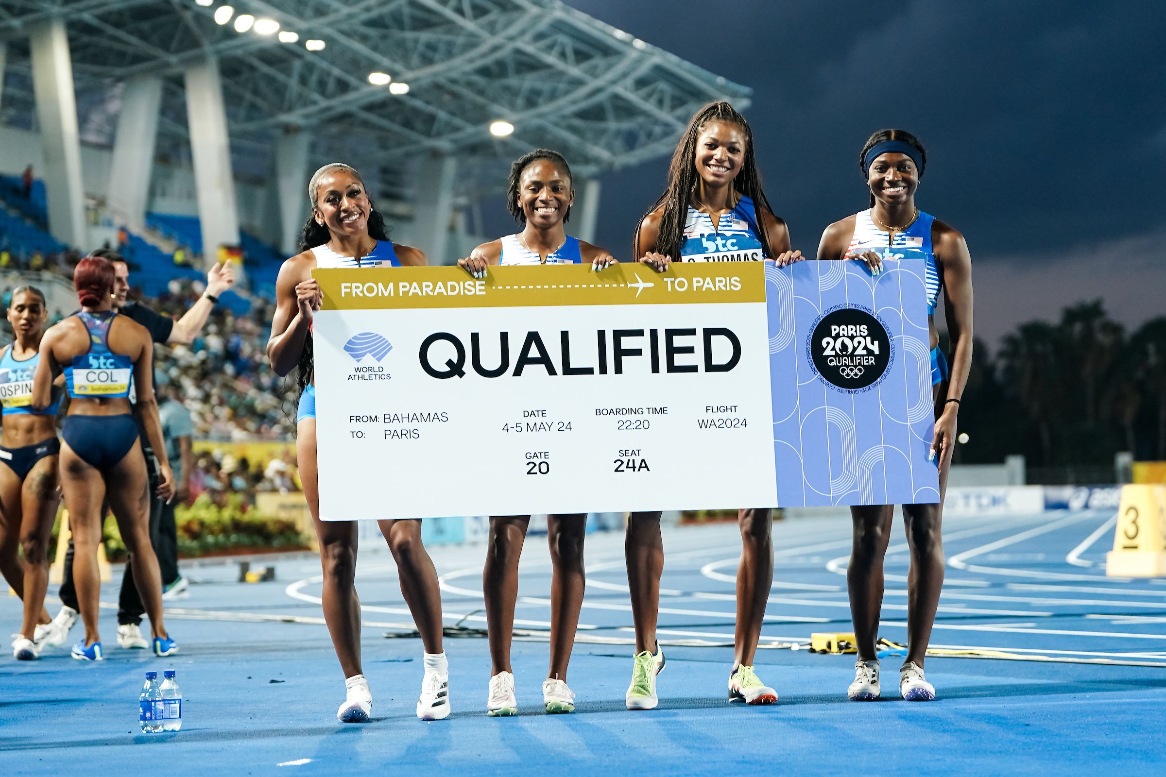 USA's 4x100m women celebrate their Olympic qualification
