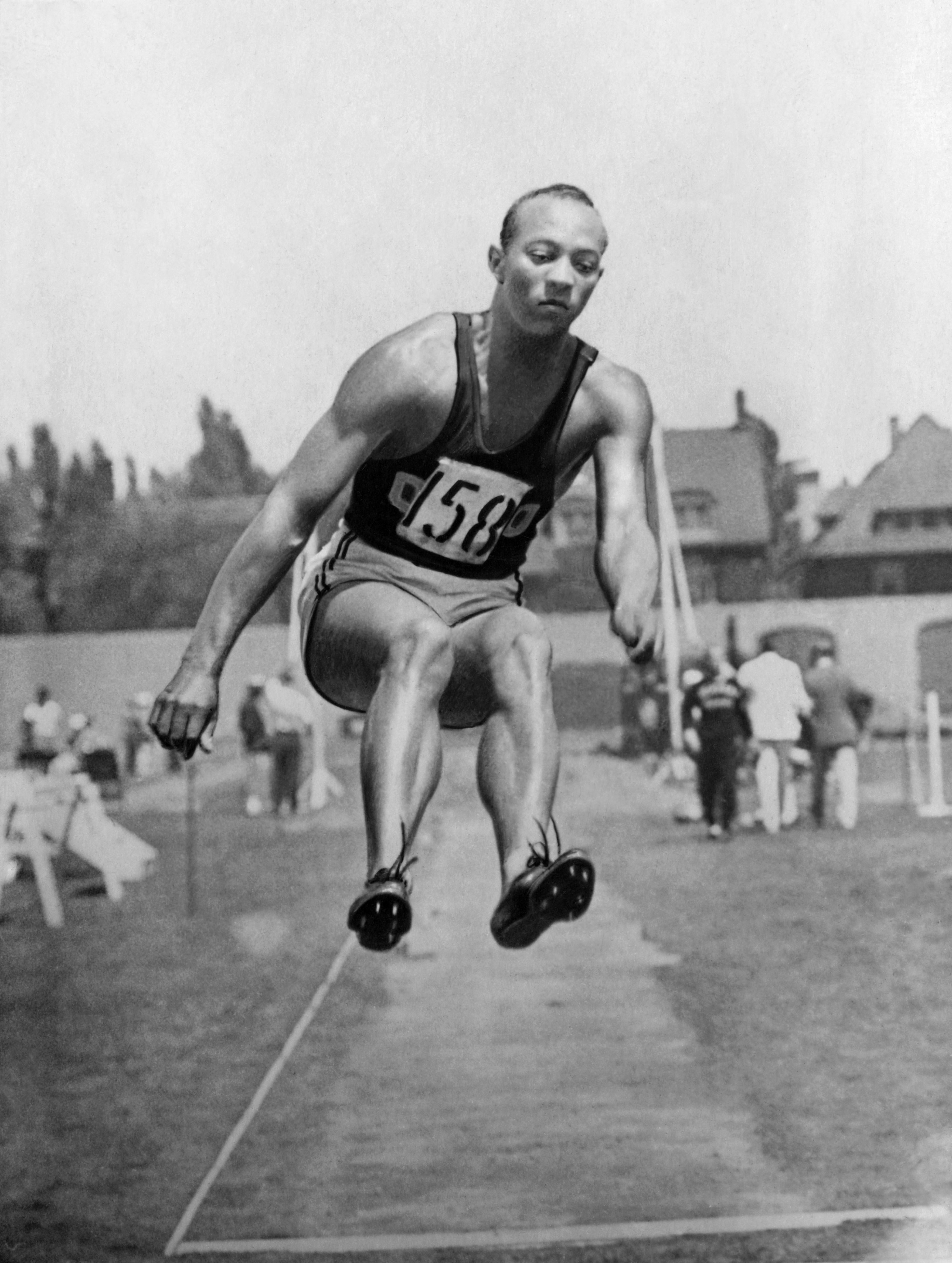Jesse Owens in action in the long jump